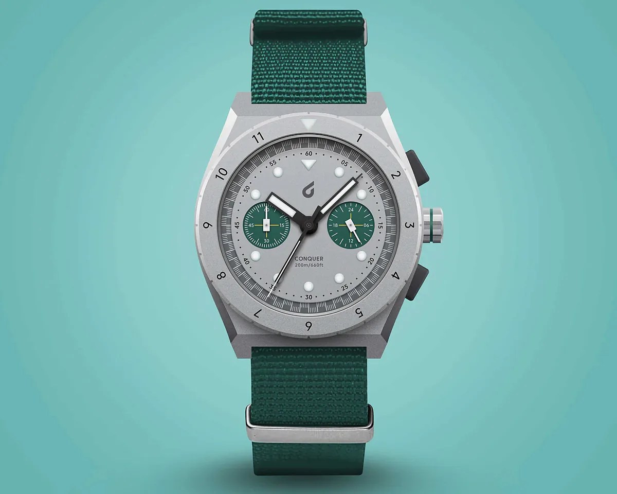 a gray chronograph watch with a green strap