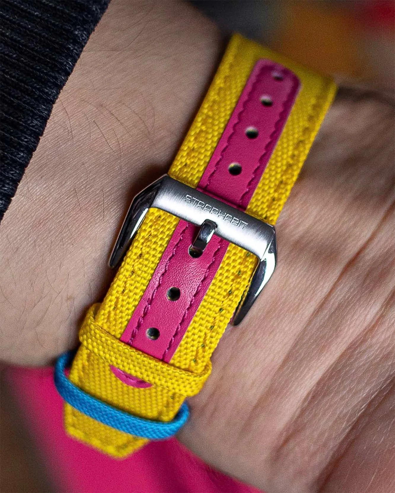 a watch strap on a man's wrist