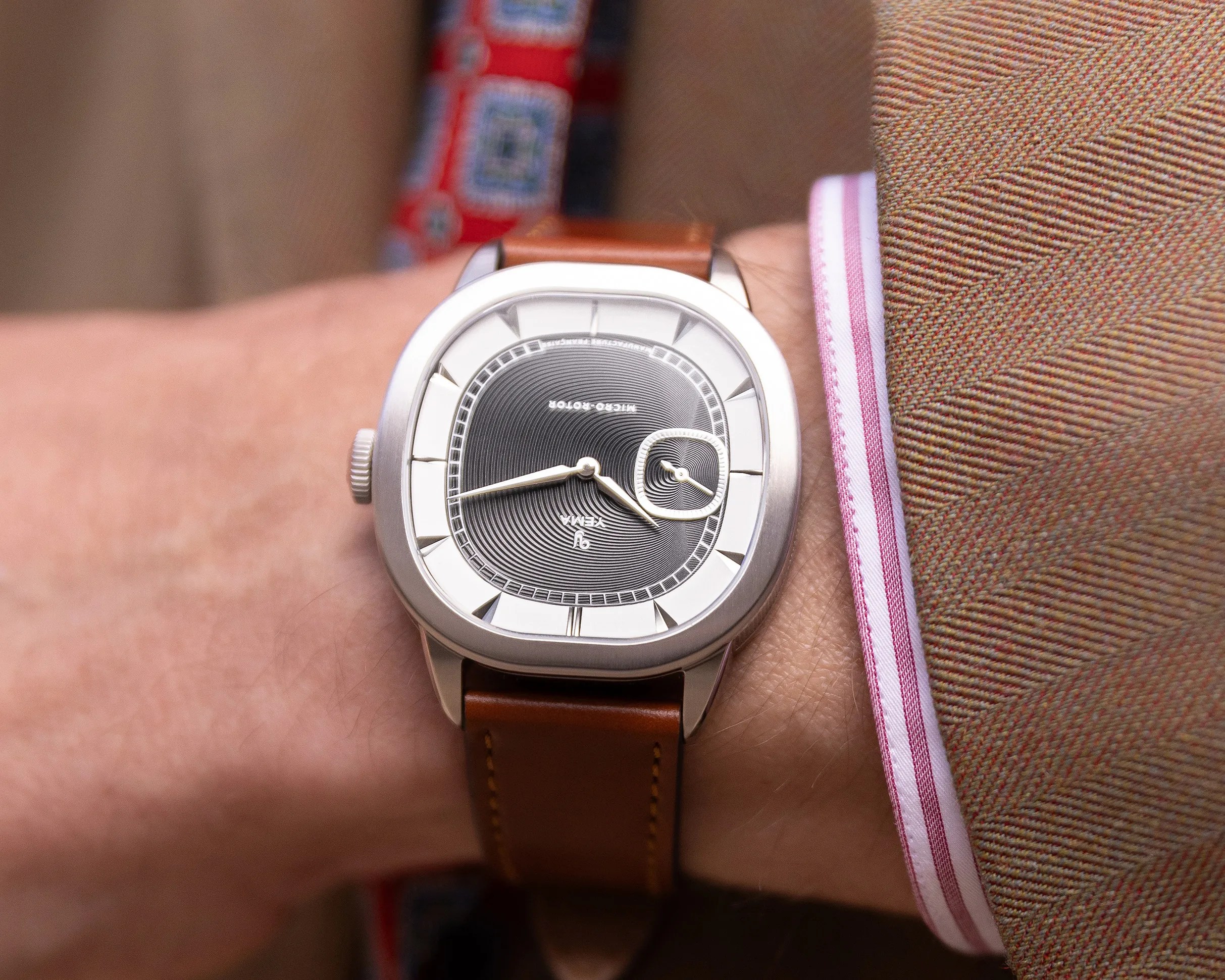 a gray dial Yema dress watch on a man's wrist