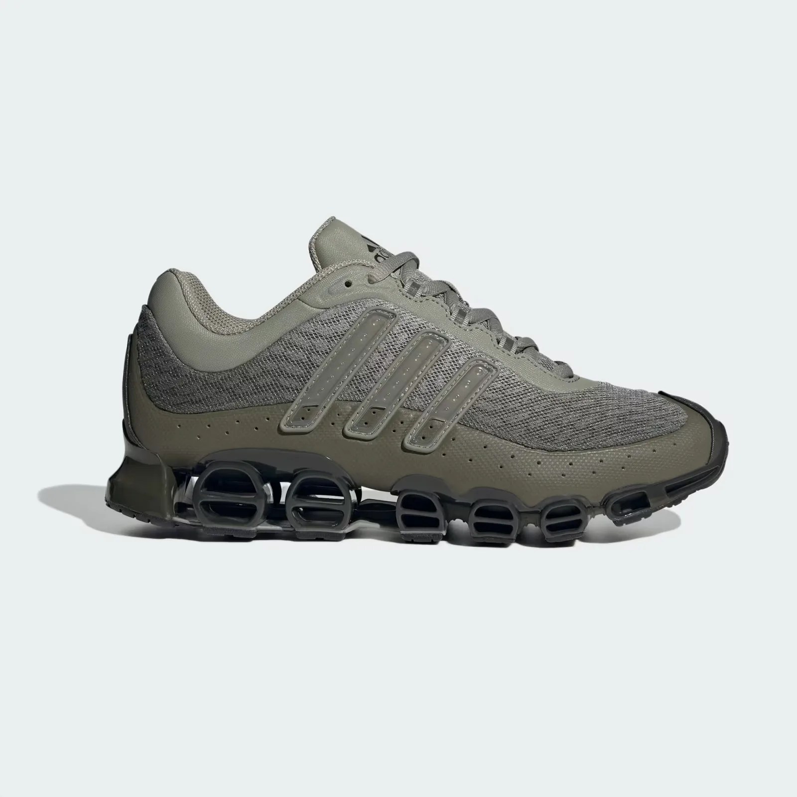 A single Adidas Megaride sneaker shown in profile with the toe facing to the right of the image frame. 