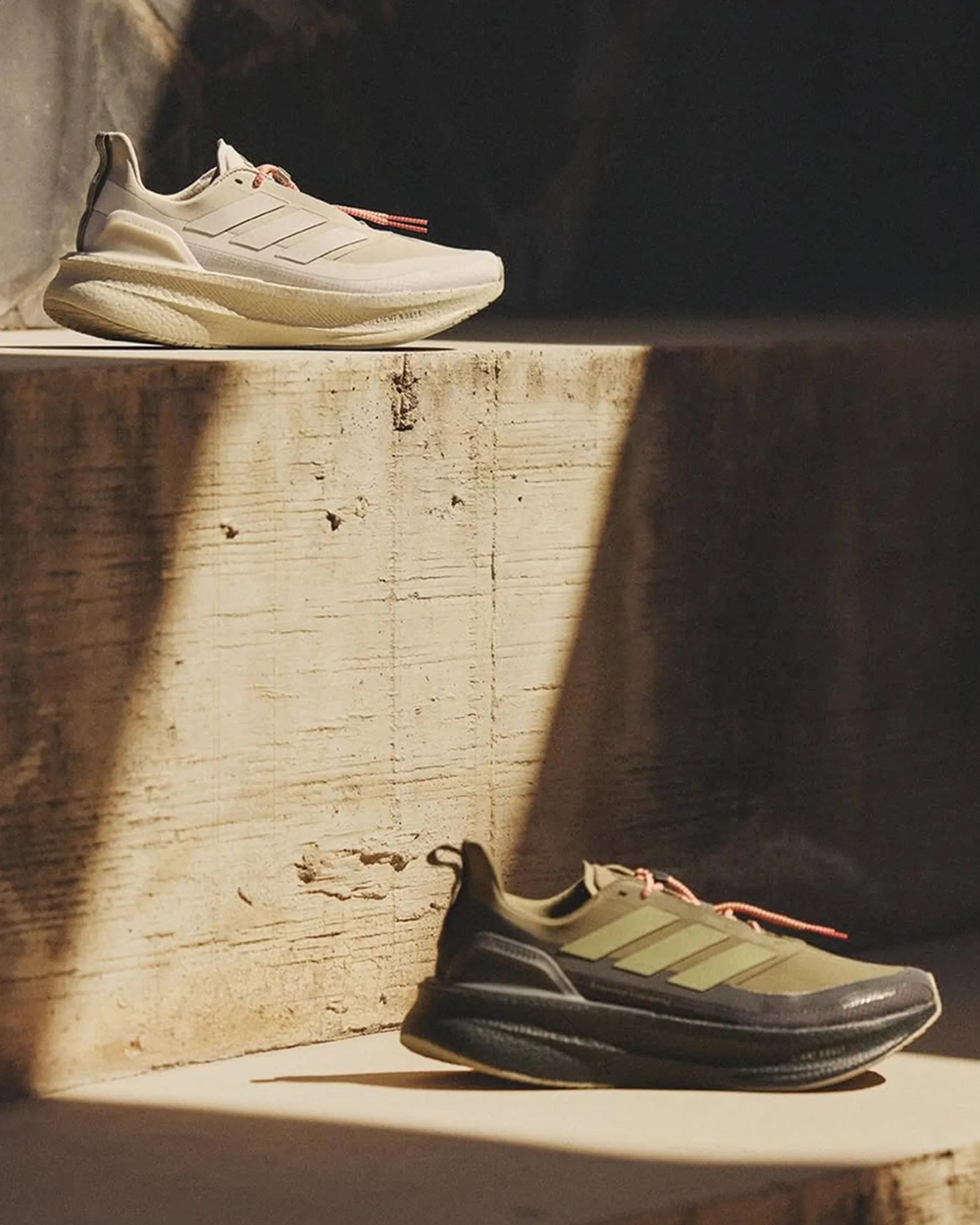 Adidas x Hermanos Koumori Ultraboost 5 HK Running Shoes on concrete in sunlight