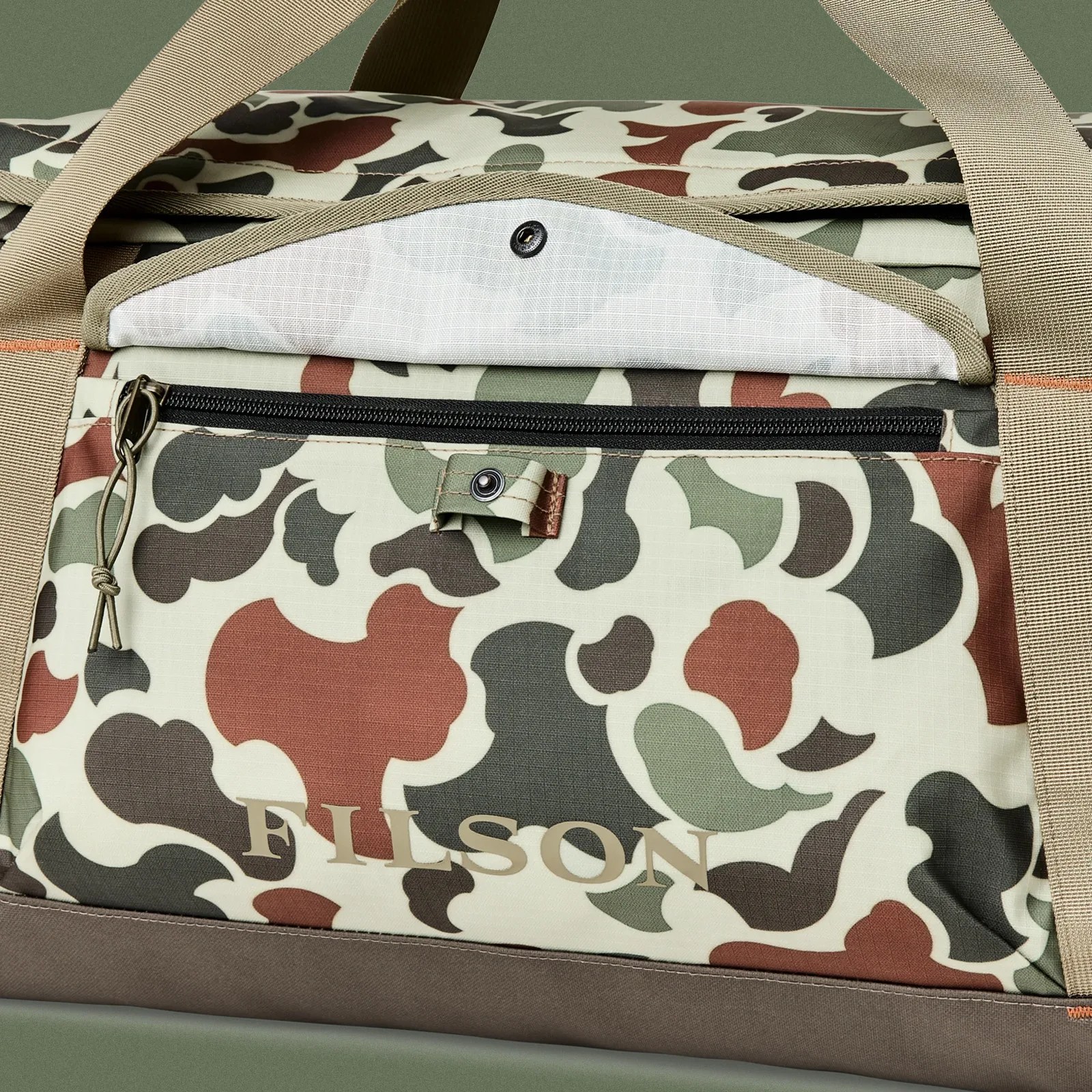 A close-up of the exterior pocket of the Filson Scout All-Weather 50L Duffle