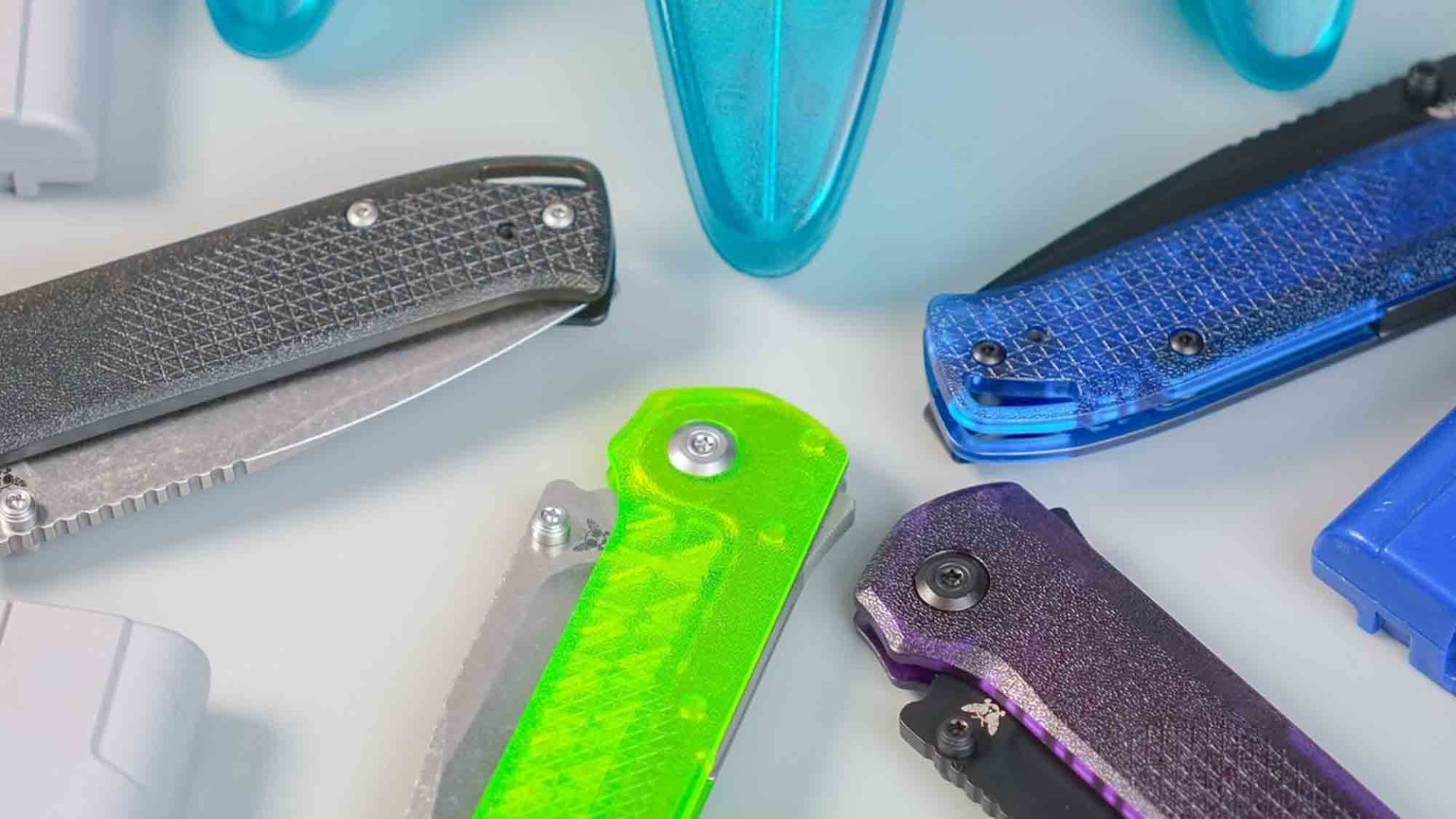 Flytanium Arcade Lite EDC Knives closed arranged with retro tech