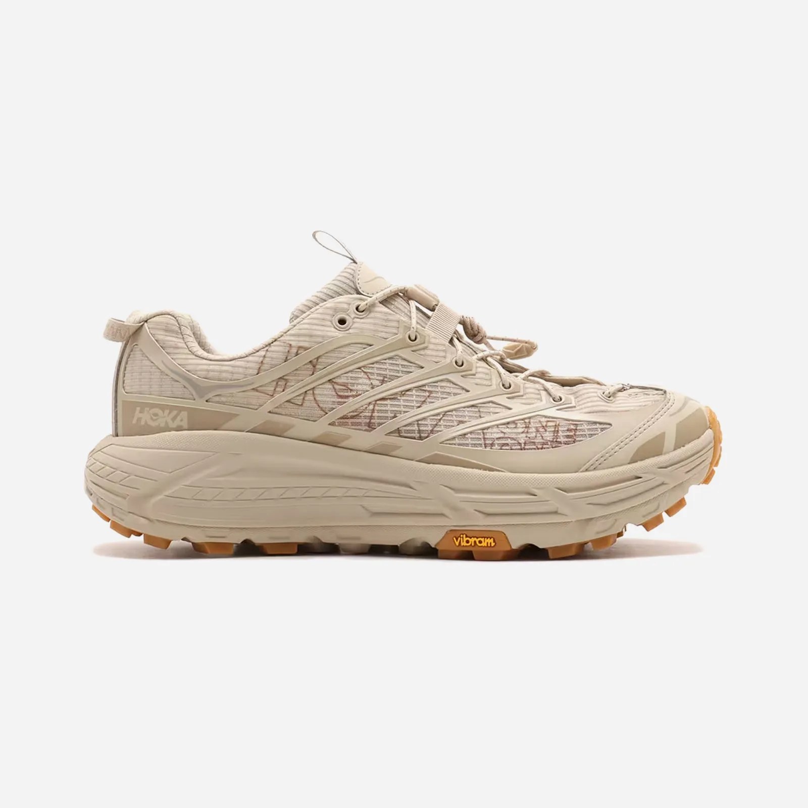 A Hoka Mafate Three2 Grid JP in "Raw Linen / Sand" shown in profile
