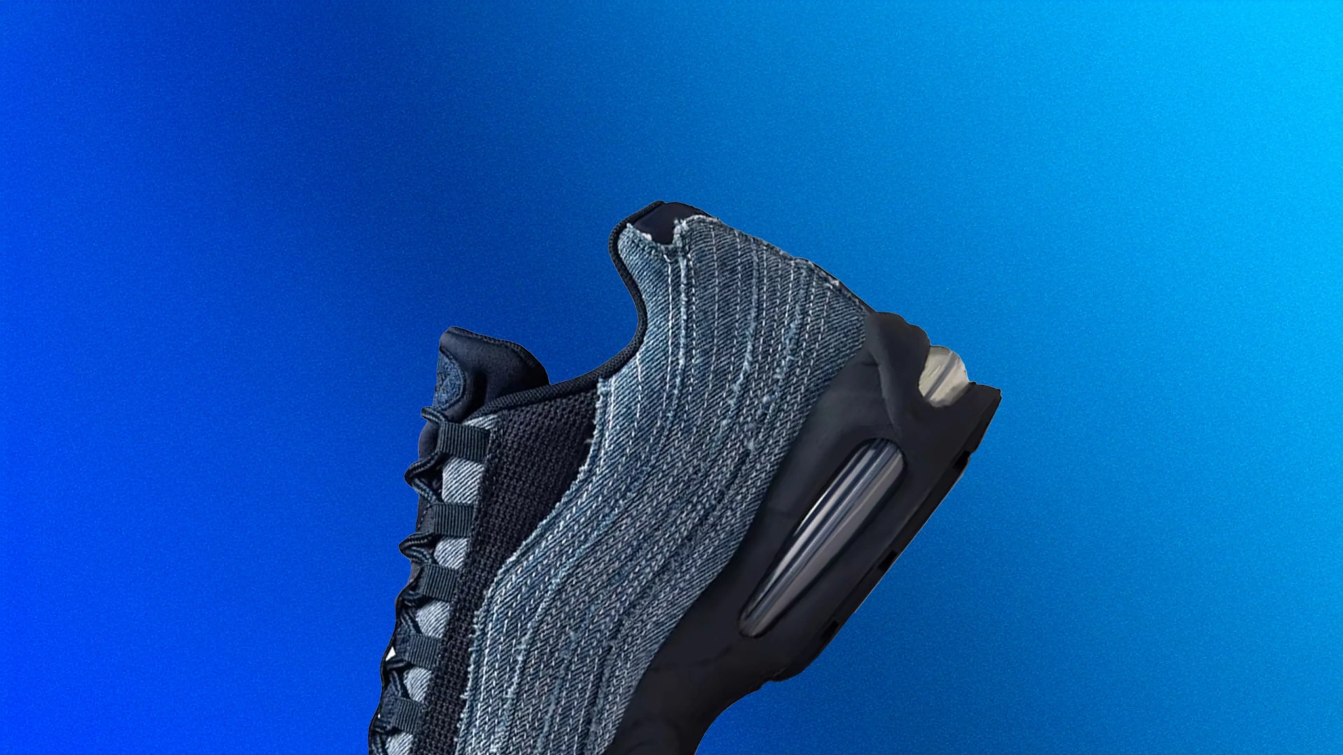 The heel of a Nike x Levi Airmax 95 shown against a blue gradient background
