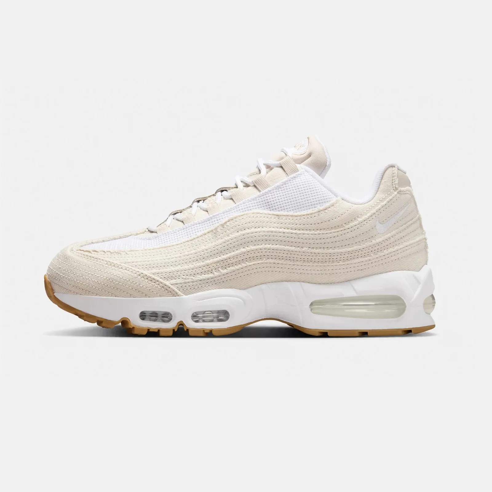 Nike x Levi's Air Max 95 in white denim on a light grey background.