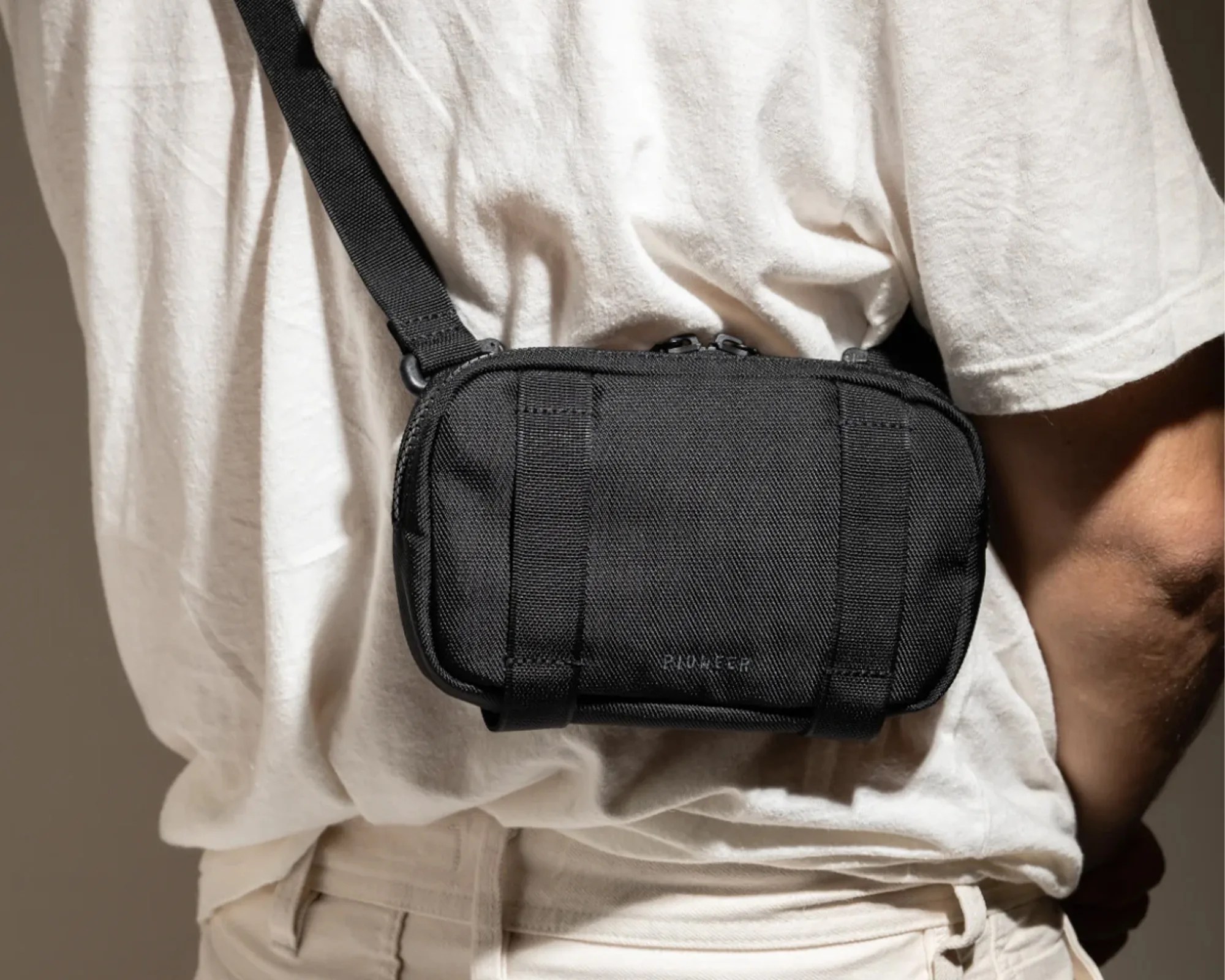 Pioneer Carry Safari EDC Sling Bag worn on person's back