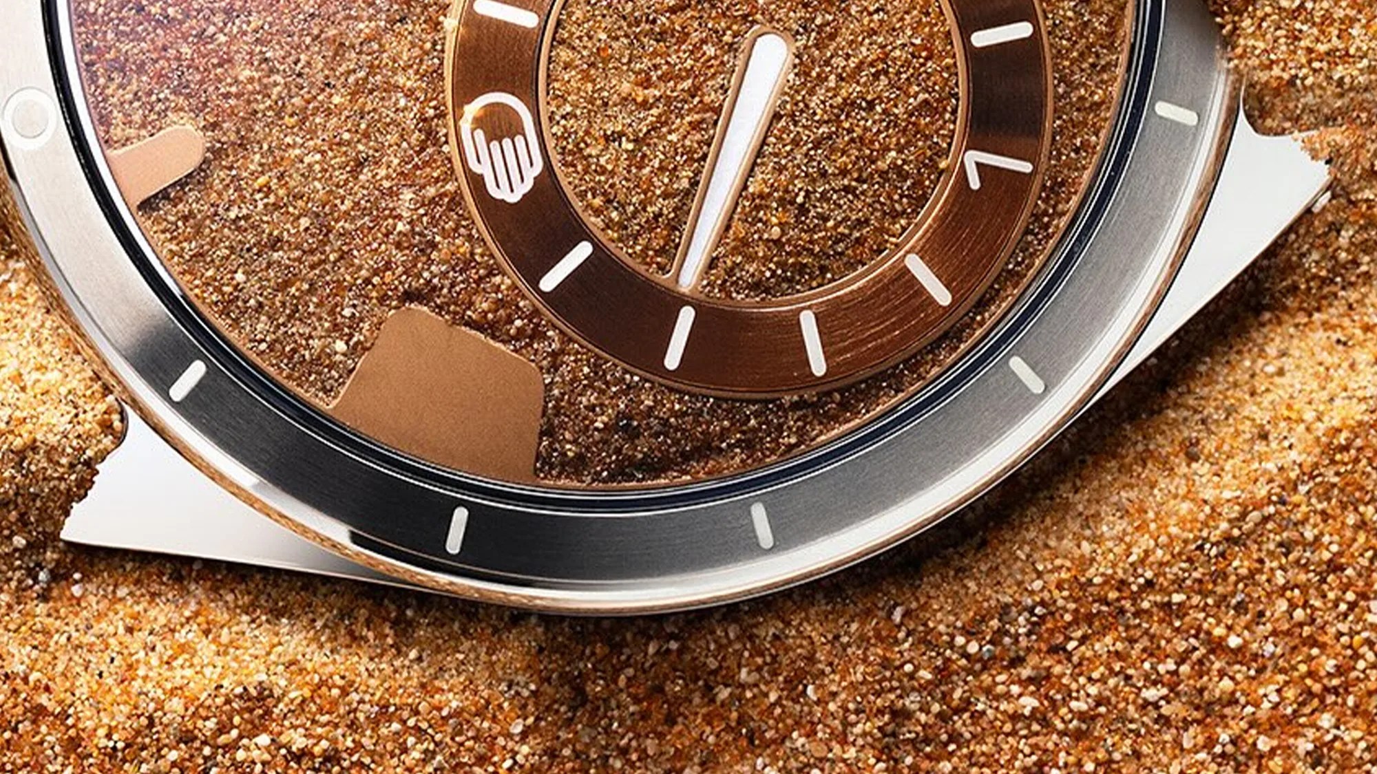 Ressence Type 9 S75 Watch buried in sand