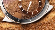 Ressence Type 9 S75 Watch buried in sand