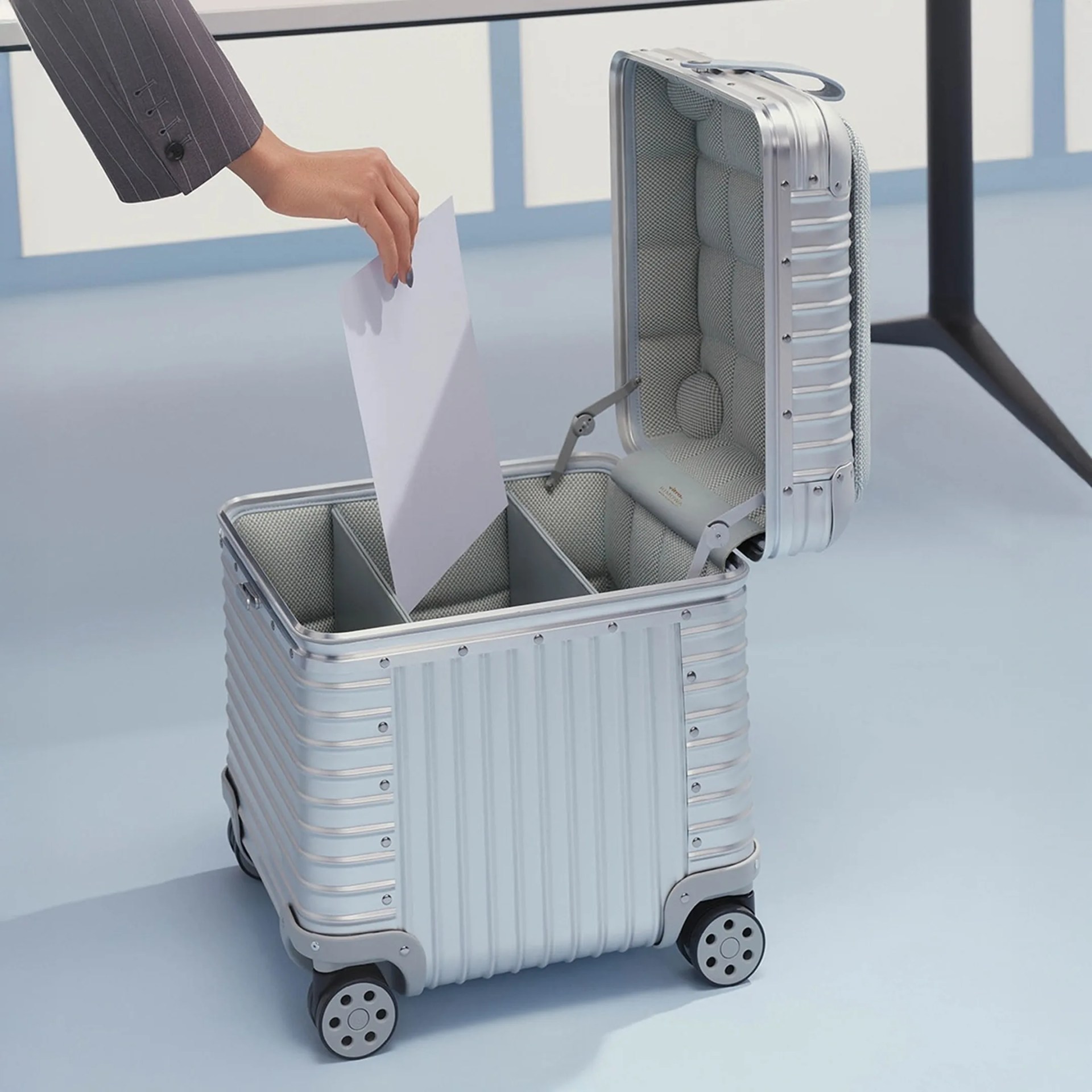 Rimowa x Vitra Aluminum Stool open in office