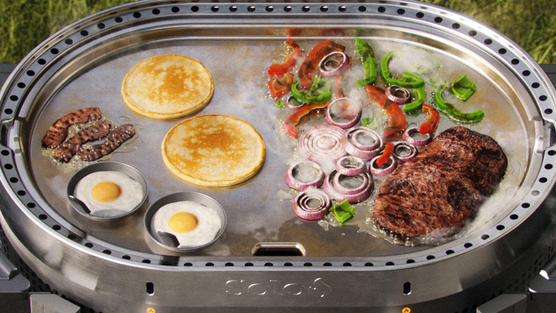 Solo Stove Steelfire Griddle closeup with food cooking on it