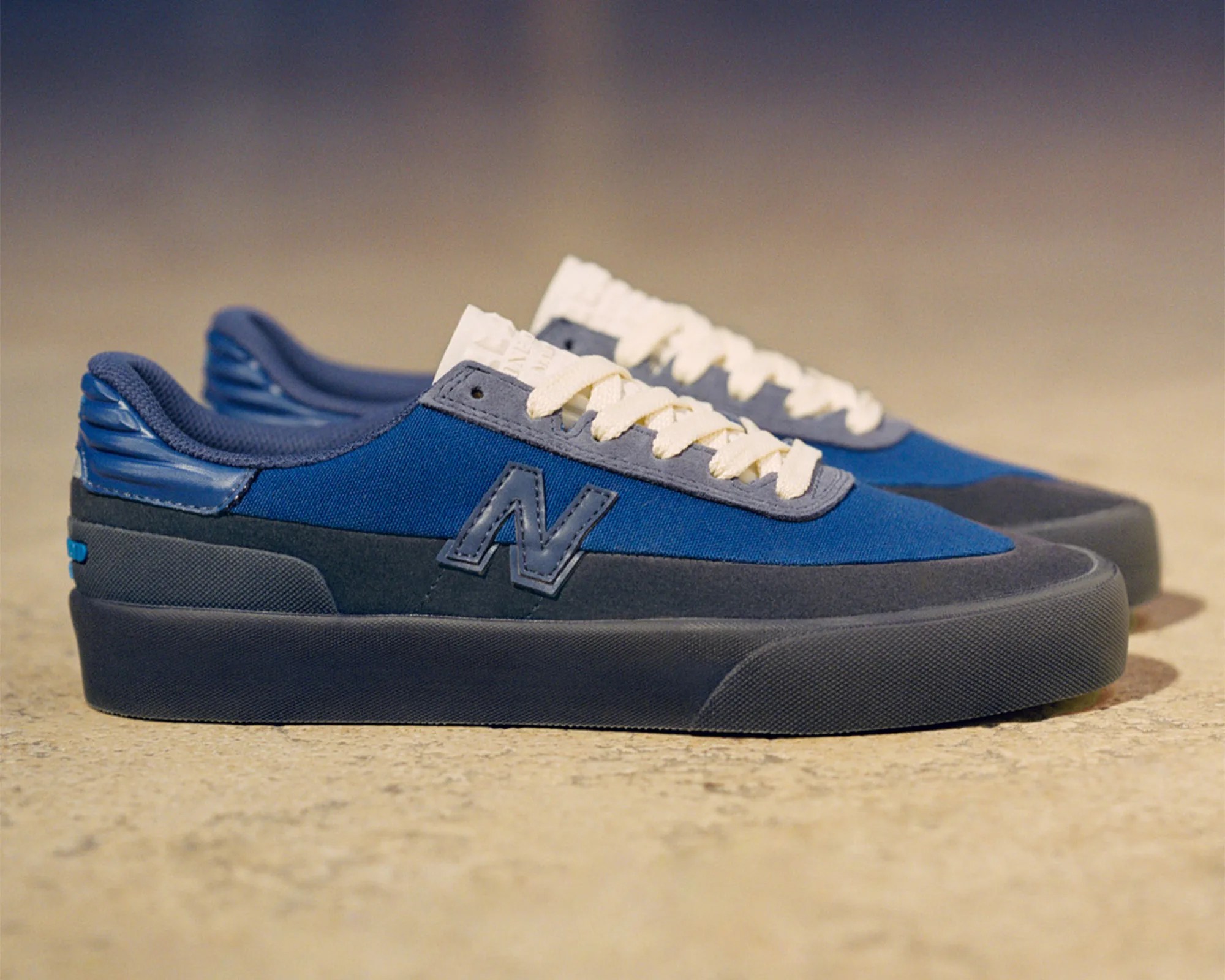 Stone Island Marina x New Balance Numeric 272 Sneaker in blue on ground