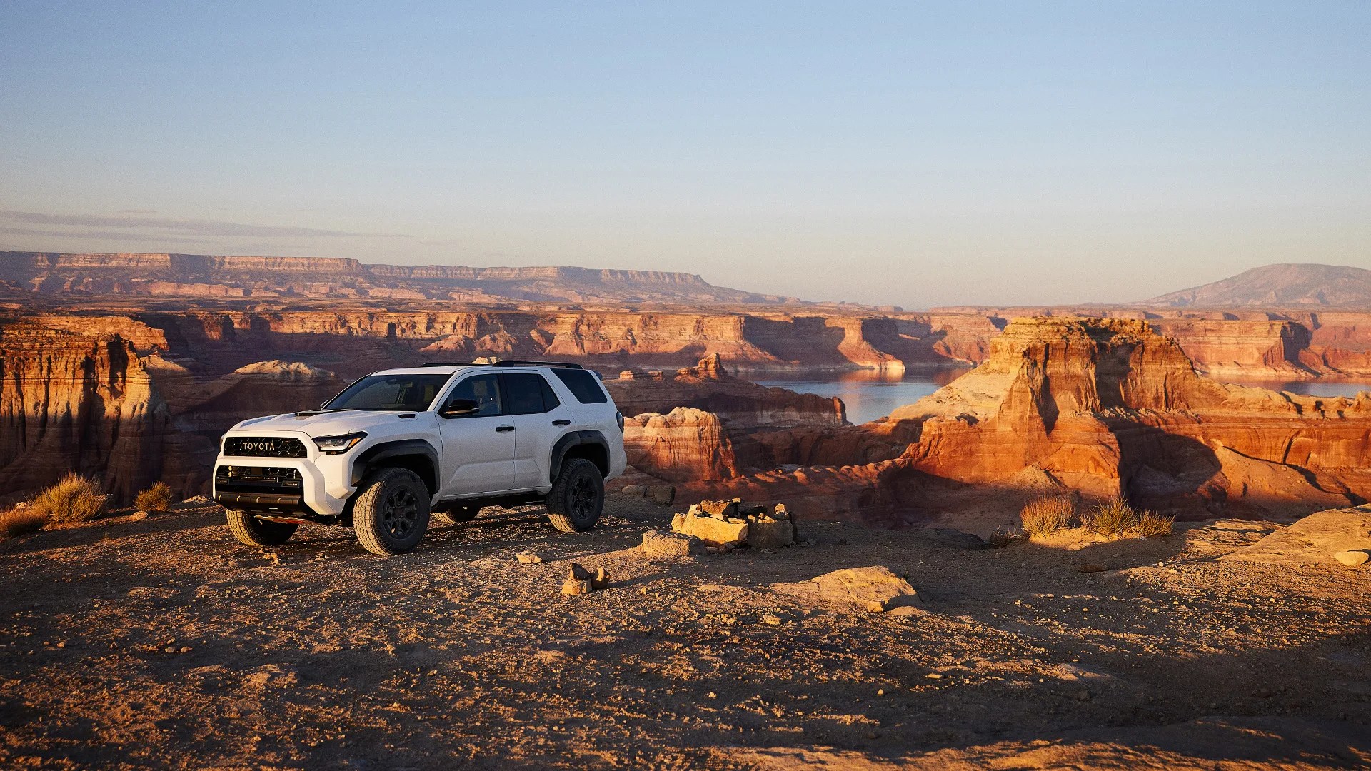 Toyota TRD Pro car in white parked by a red rock canyon