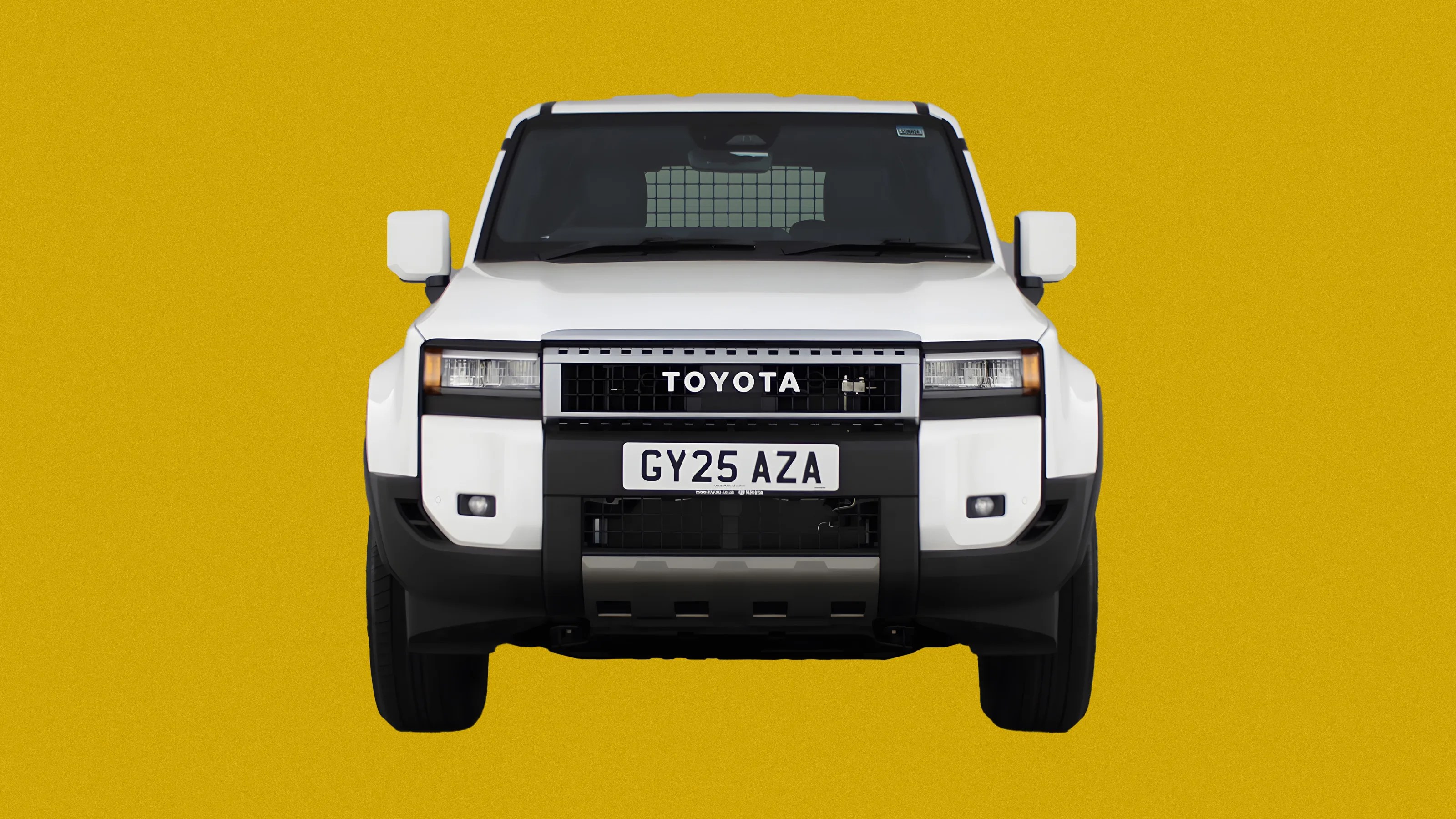A white Toyota Land Cruiser commercial facing head on against a mustard yellow background