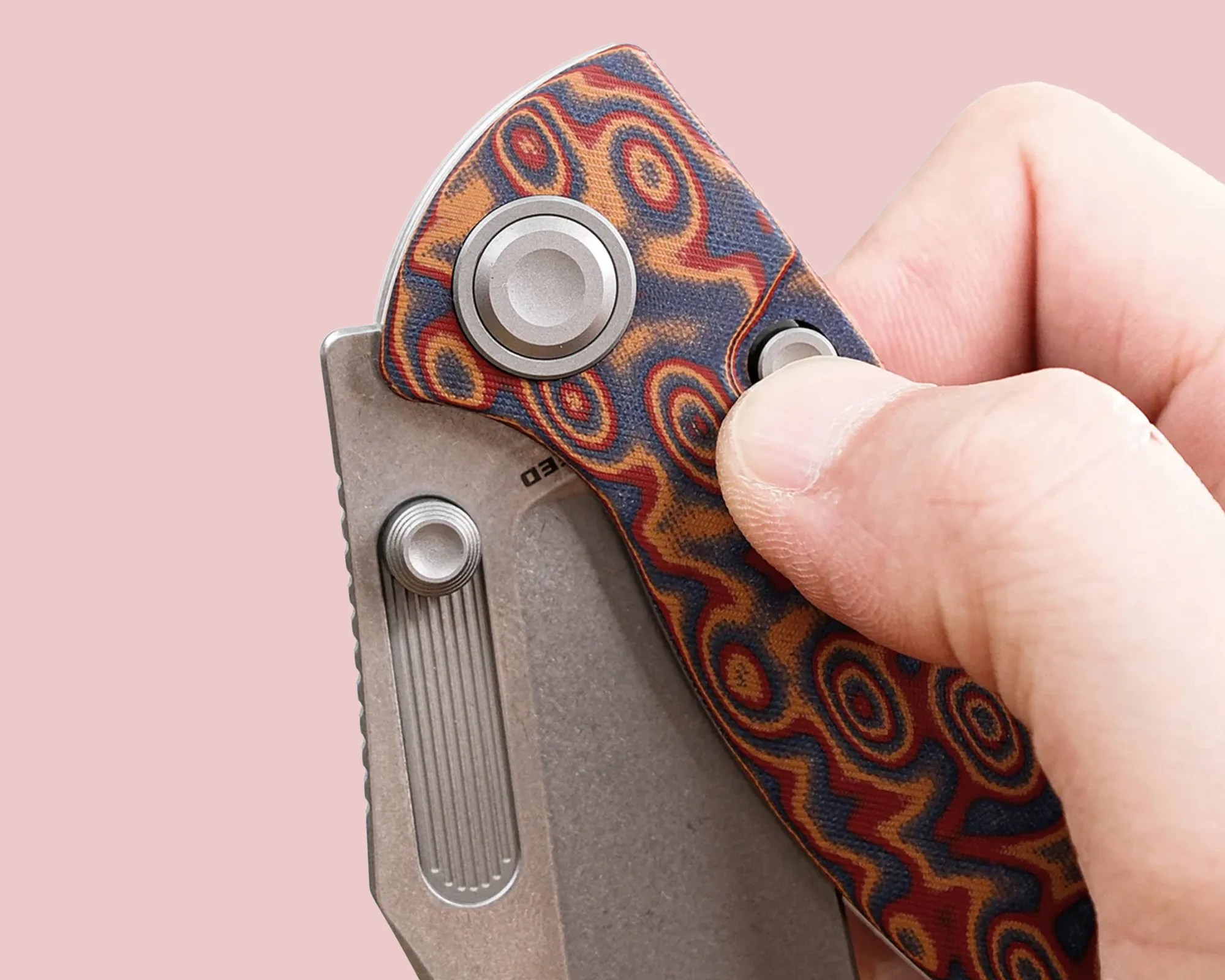 Vosteed Naga EDC Knife button lock close up