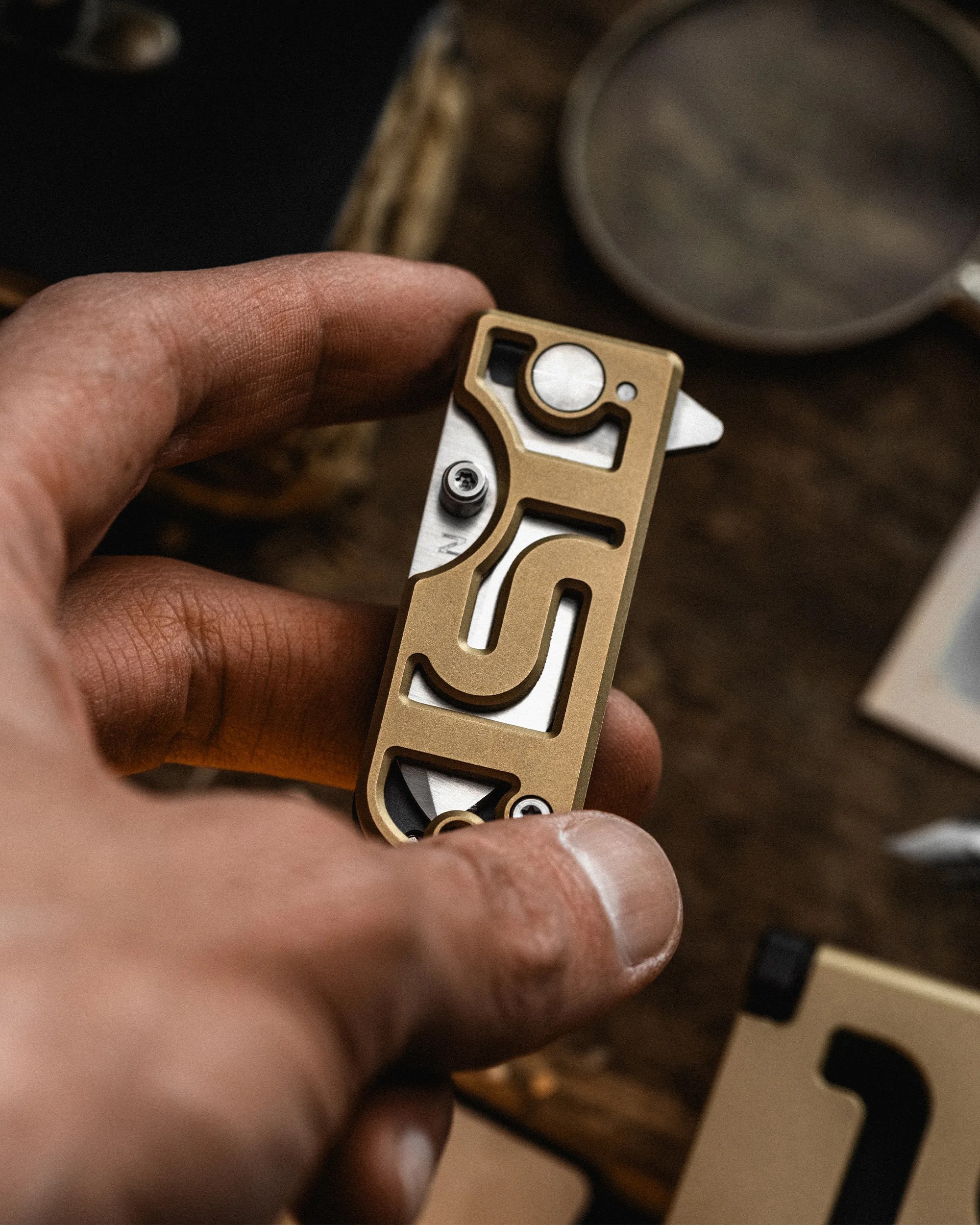 WESN x 1st Magic Puzzle Box and Microblade EDC Knife in hand