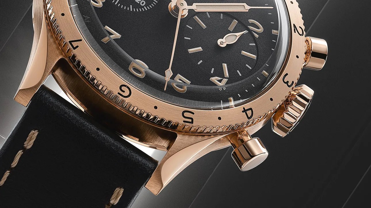 the dial and case of a gold Breguet watch