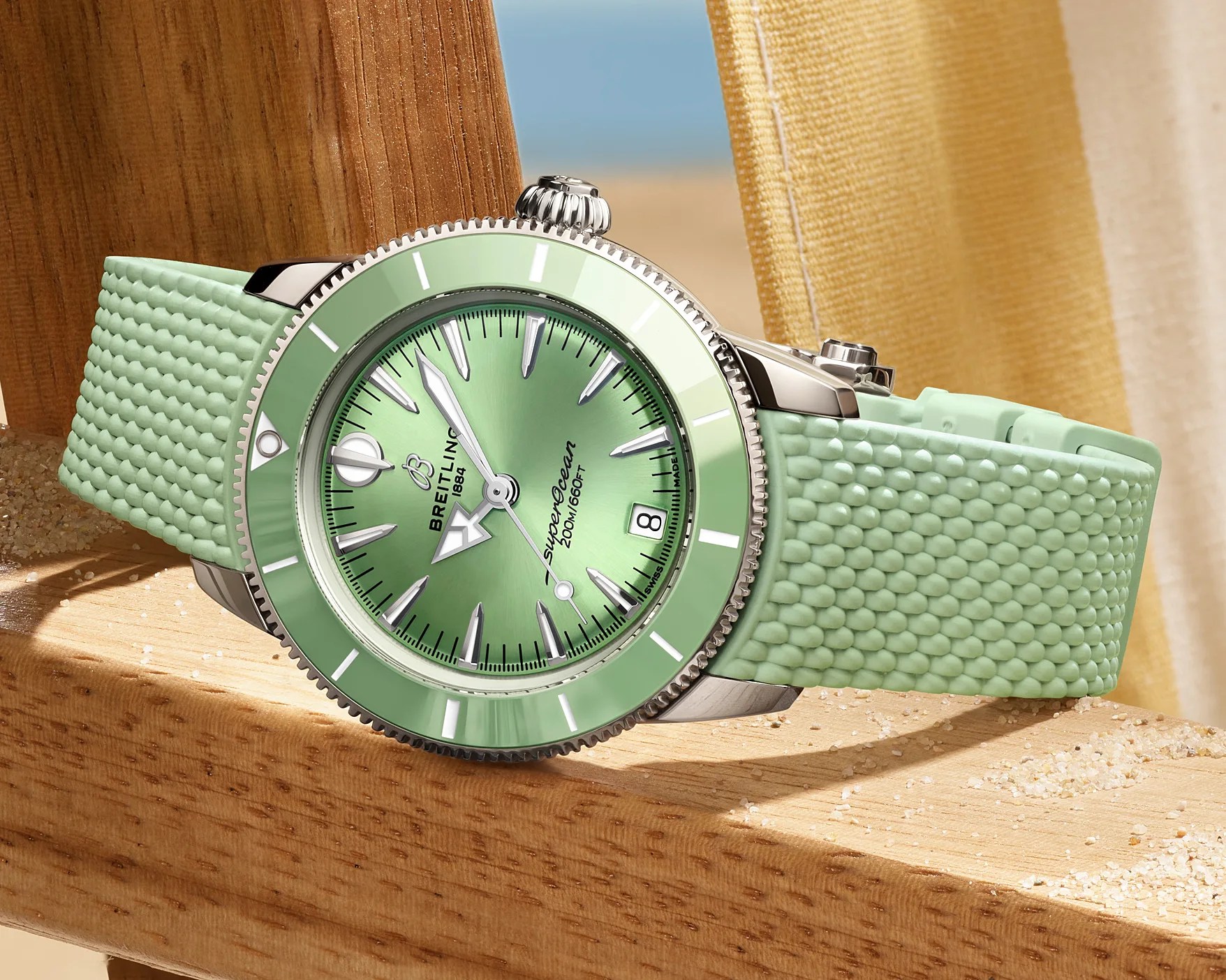 a green Breitling dive watch