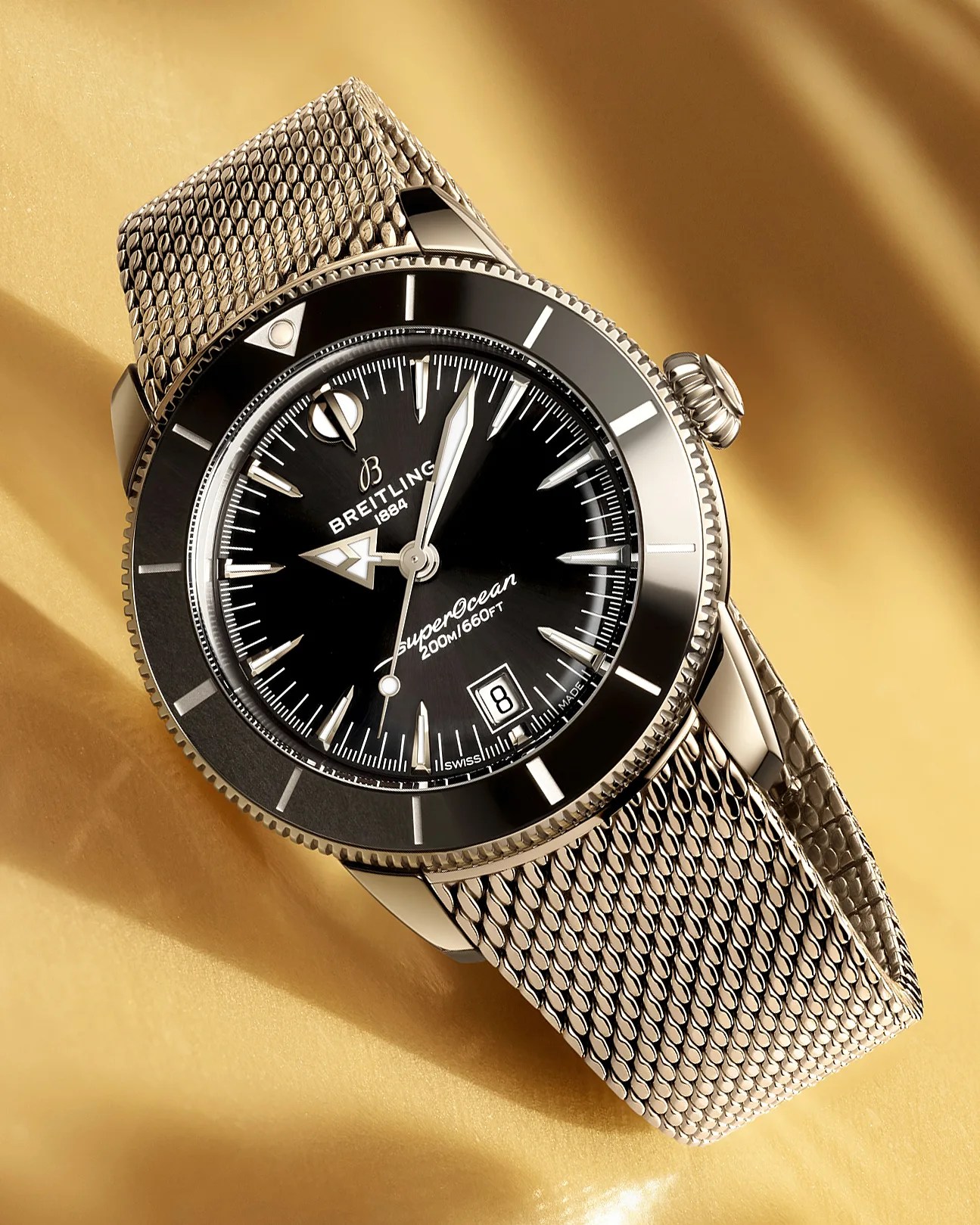 a black Breitling dive watch