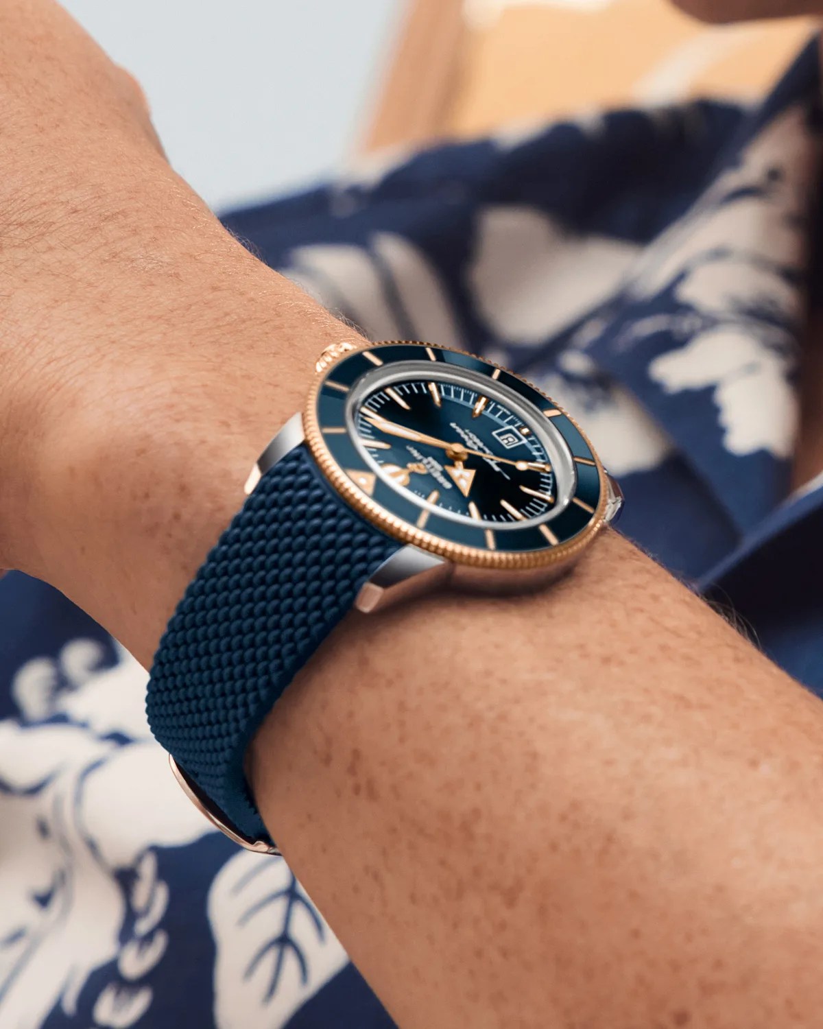 a Breitling watch on a man's wrist