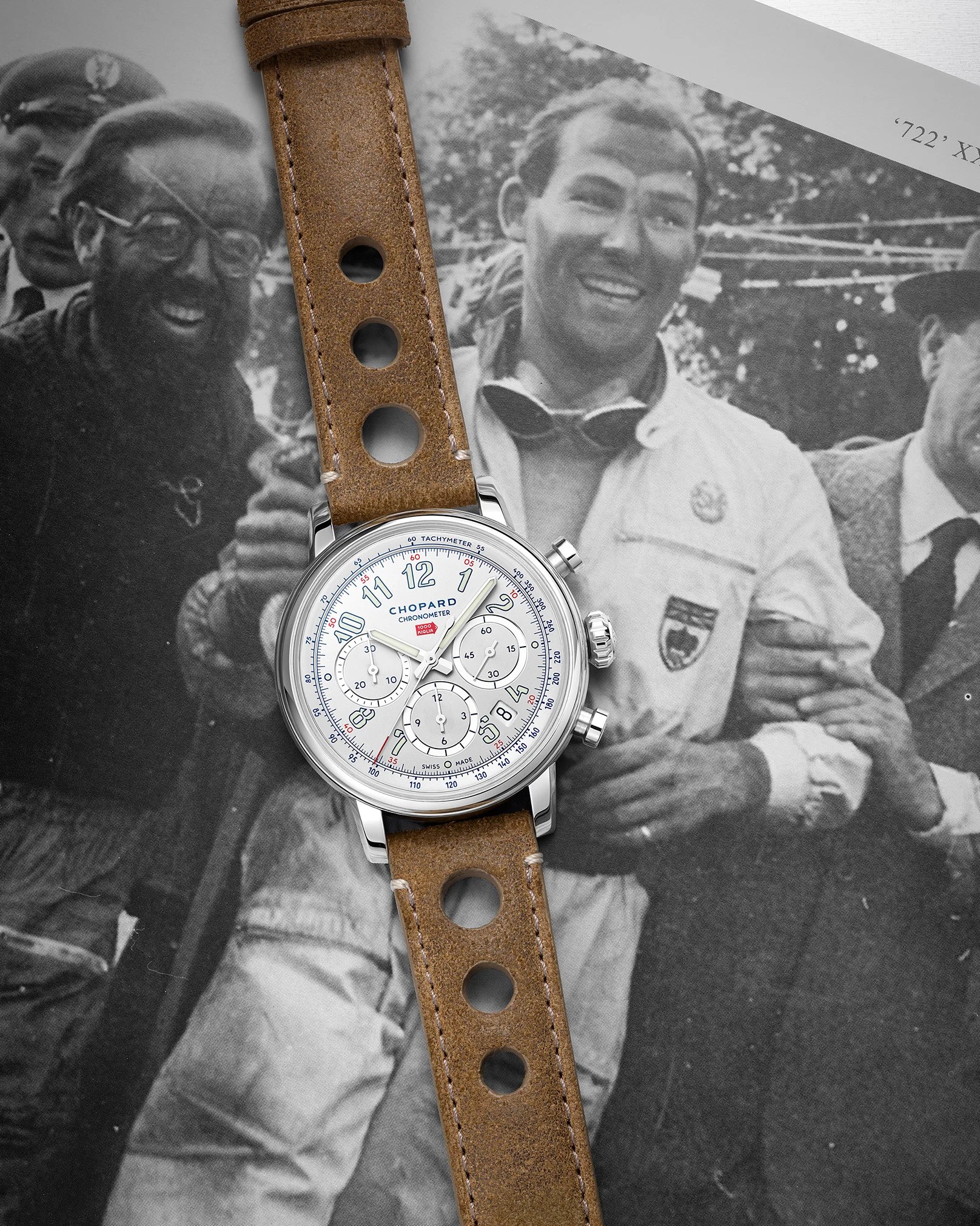 a watch laying on a newspaper