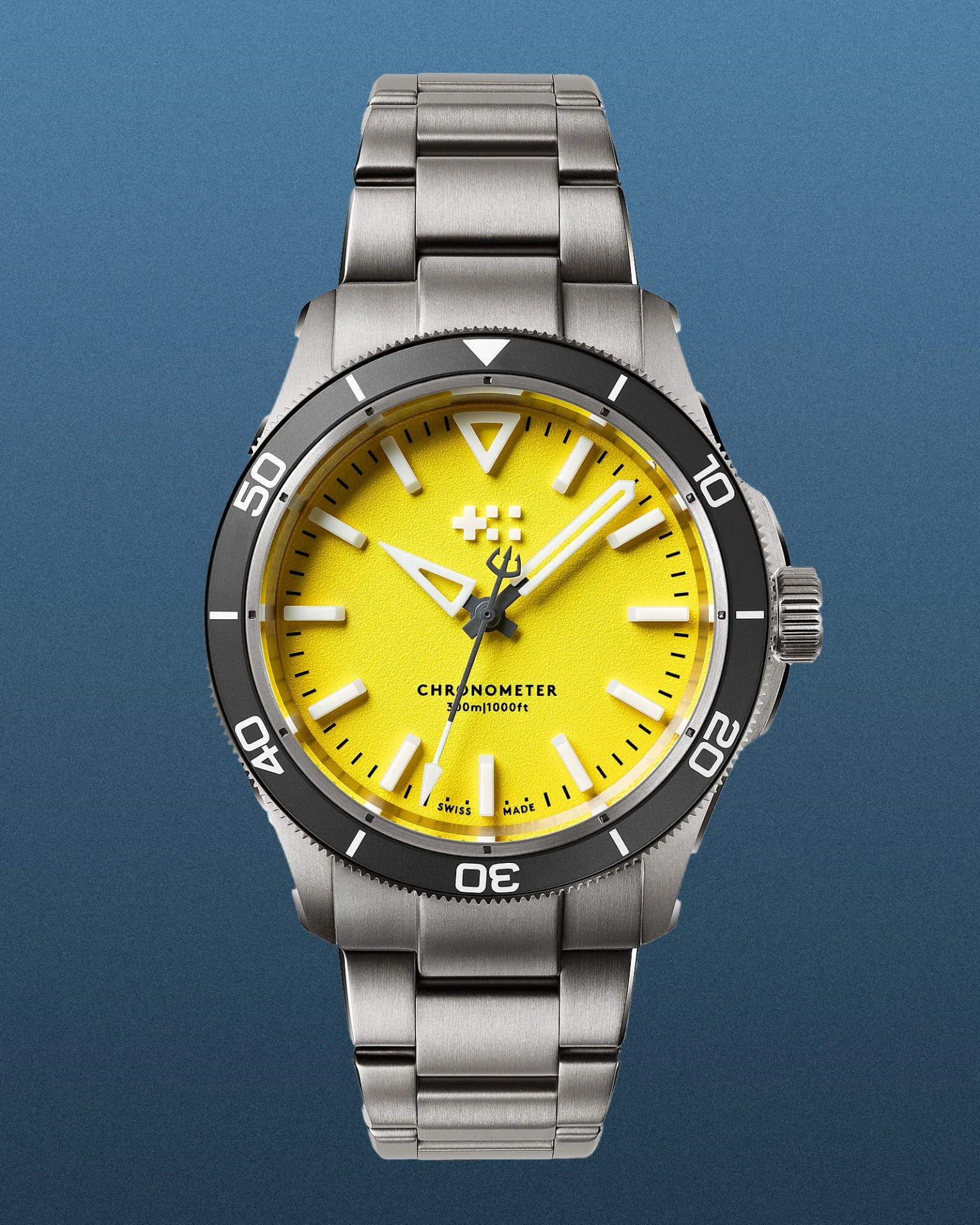 a Christopher Ward dive watch with a yellow dial