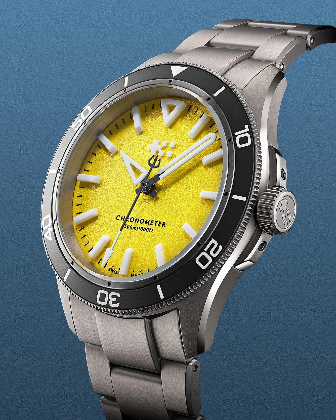 a Christopher Ward dive watch with a yellow dial