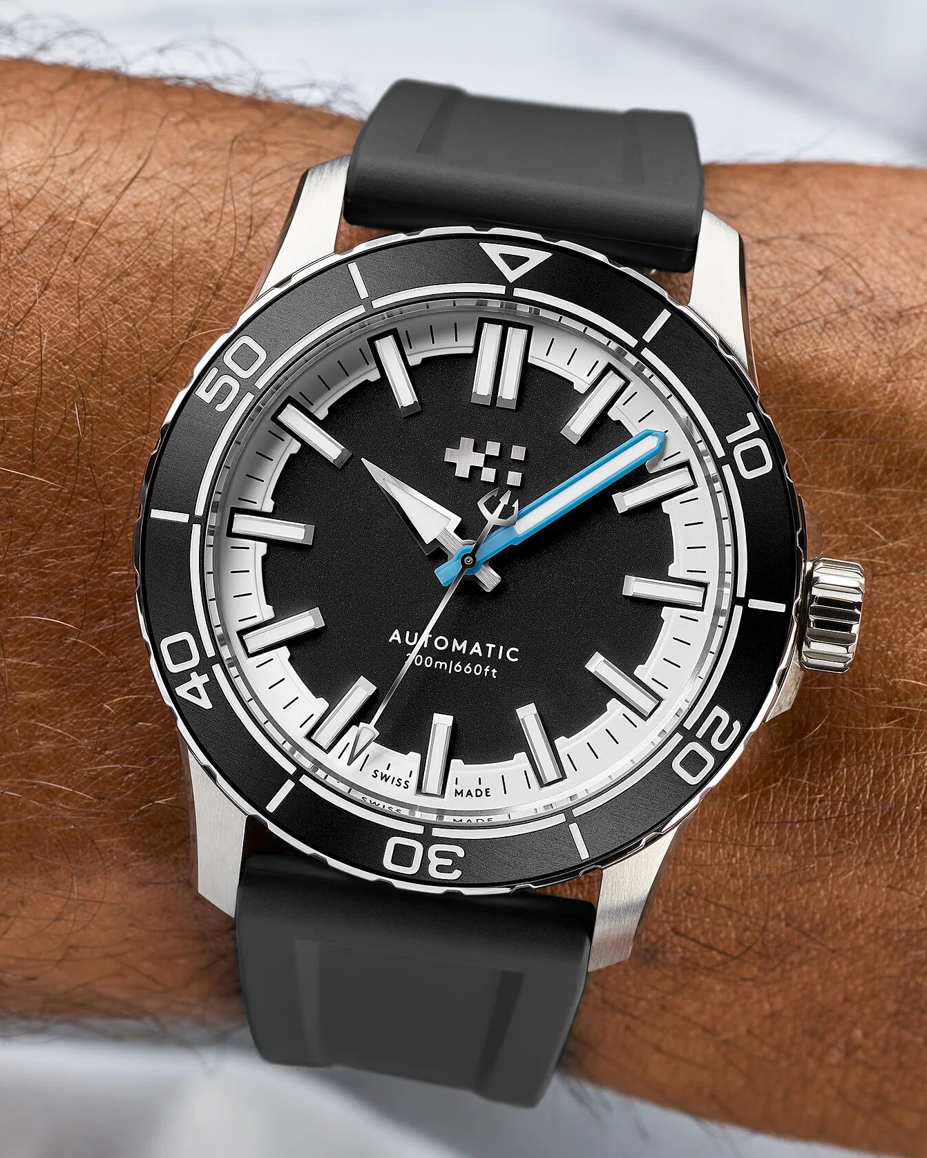 a black Christopher Ward dive watch
