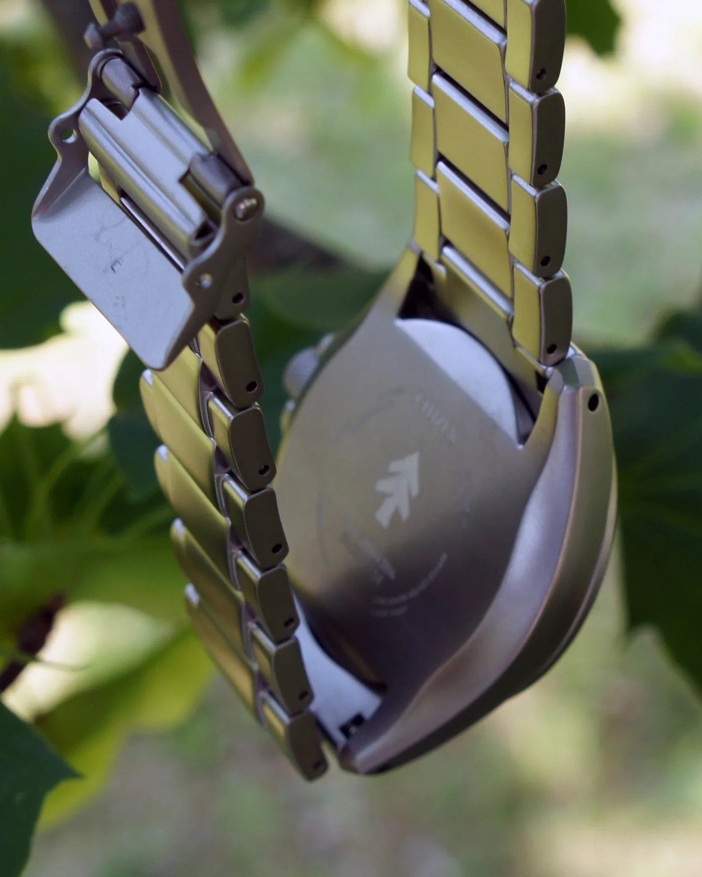 the Huckberry logo on the back of a watch