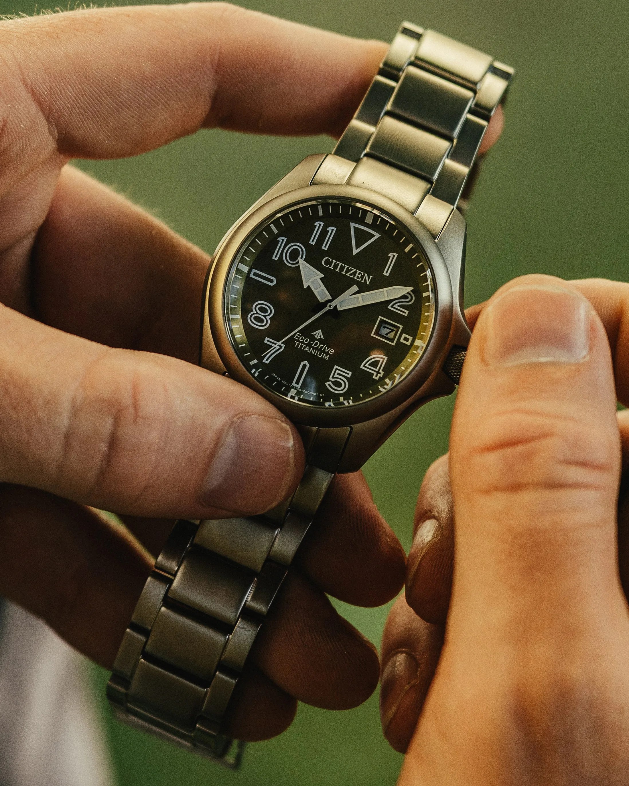 a watch in a man's hand
