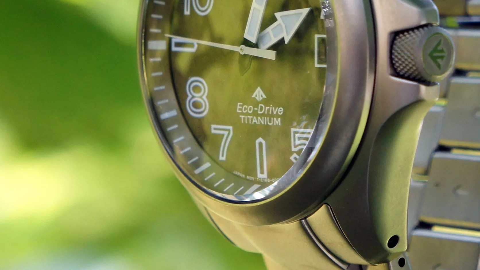a titanium Citizen field watch