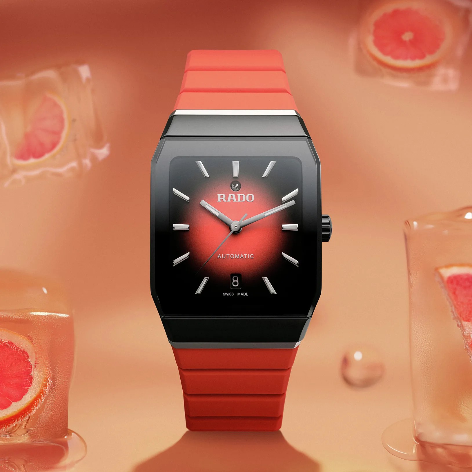 a black Rado watch with a red strap