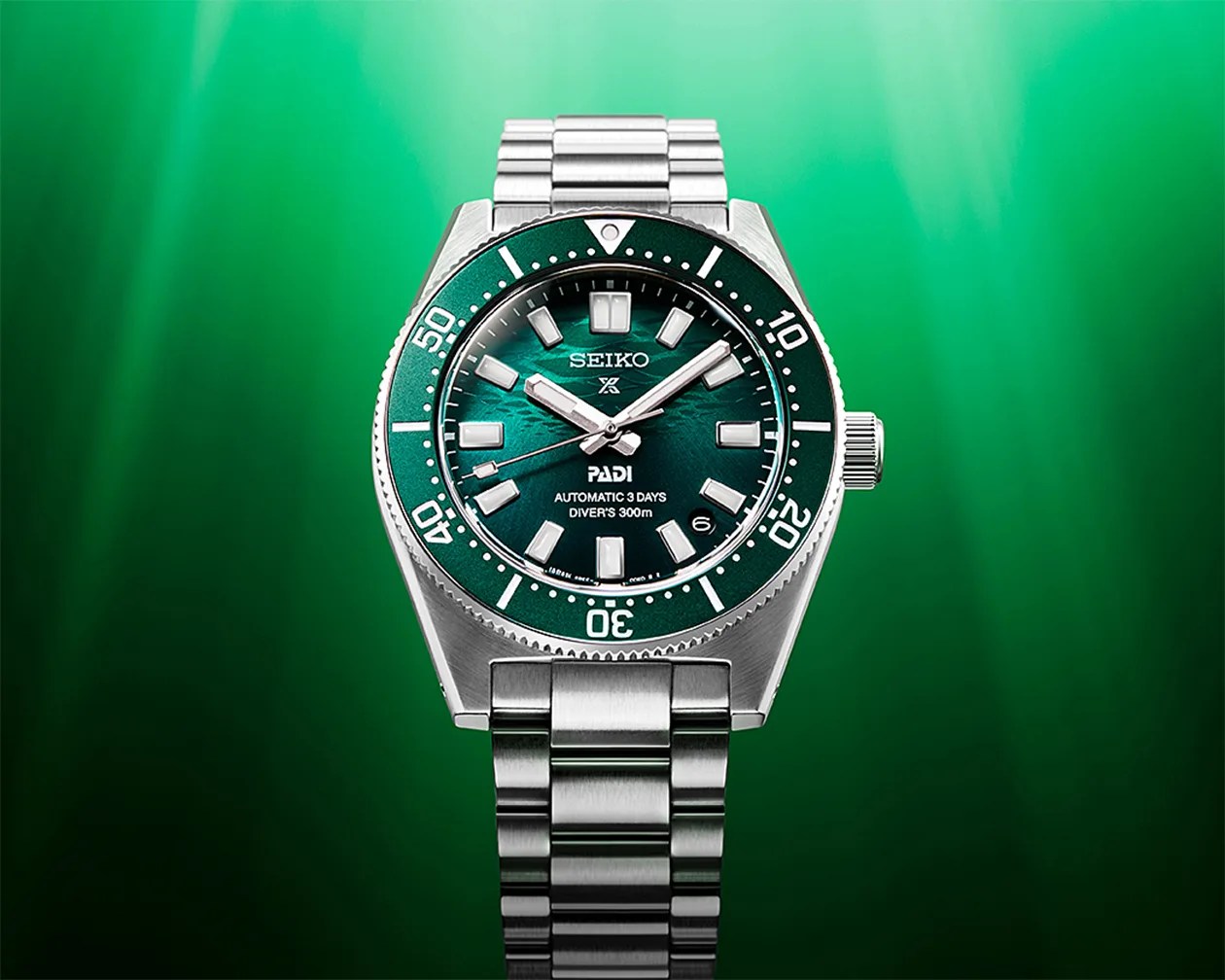a green Seiko dive watch