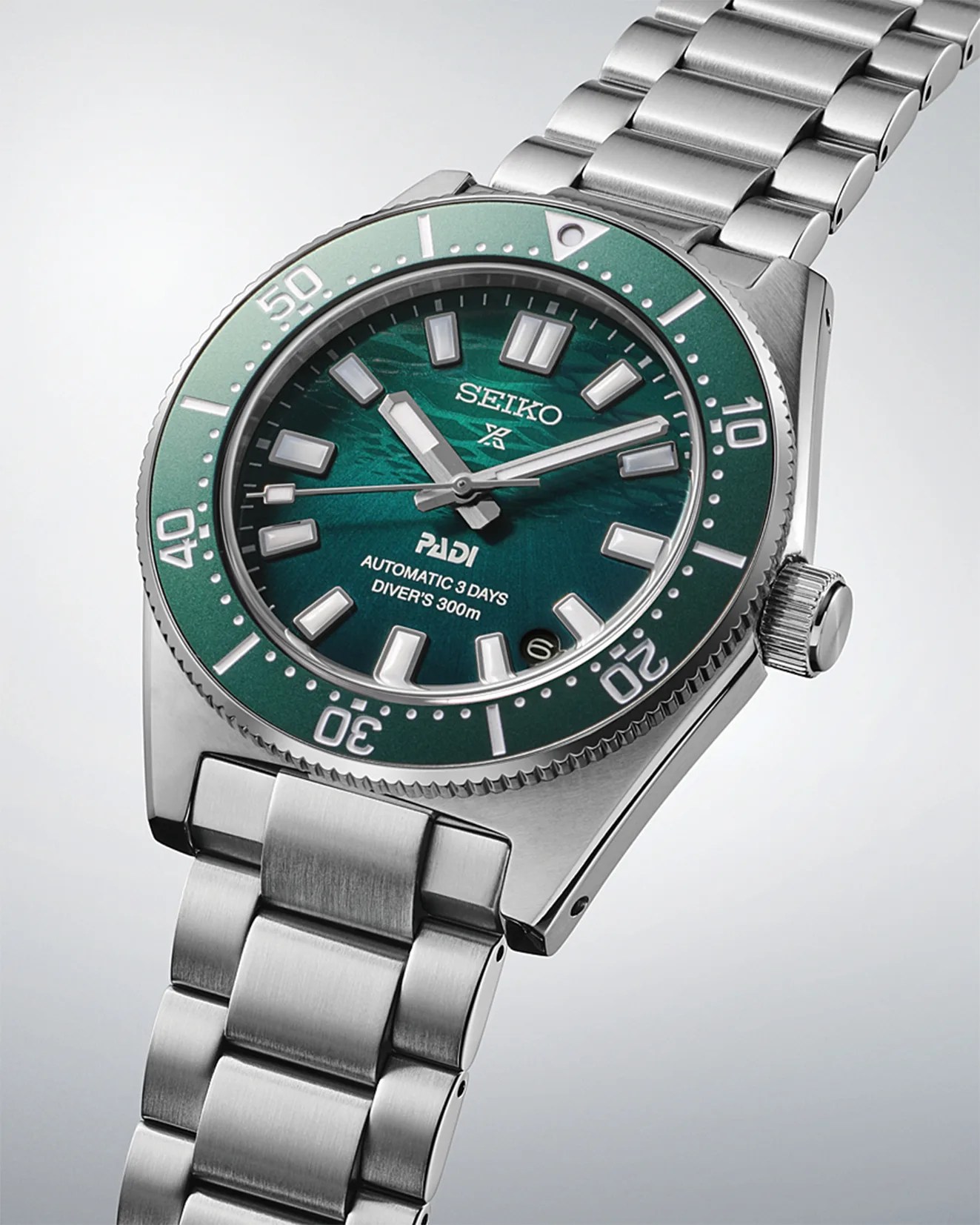 a green Seiko dive watch