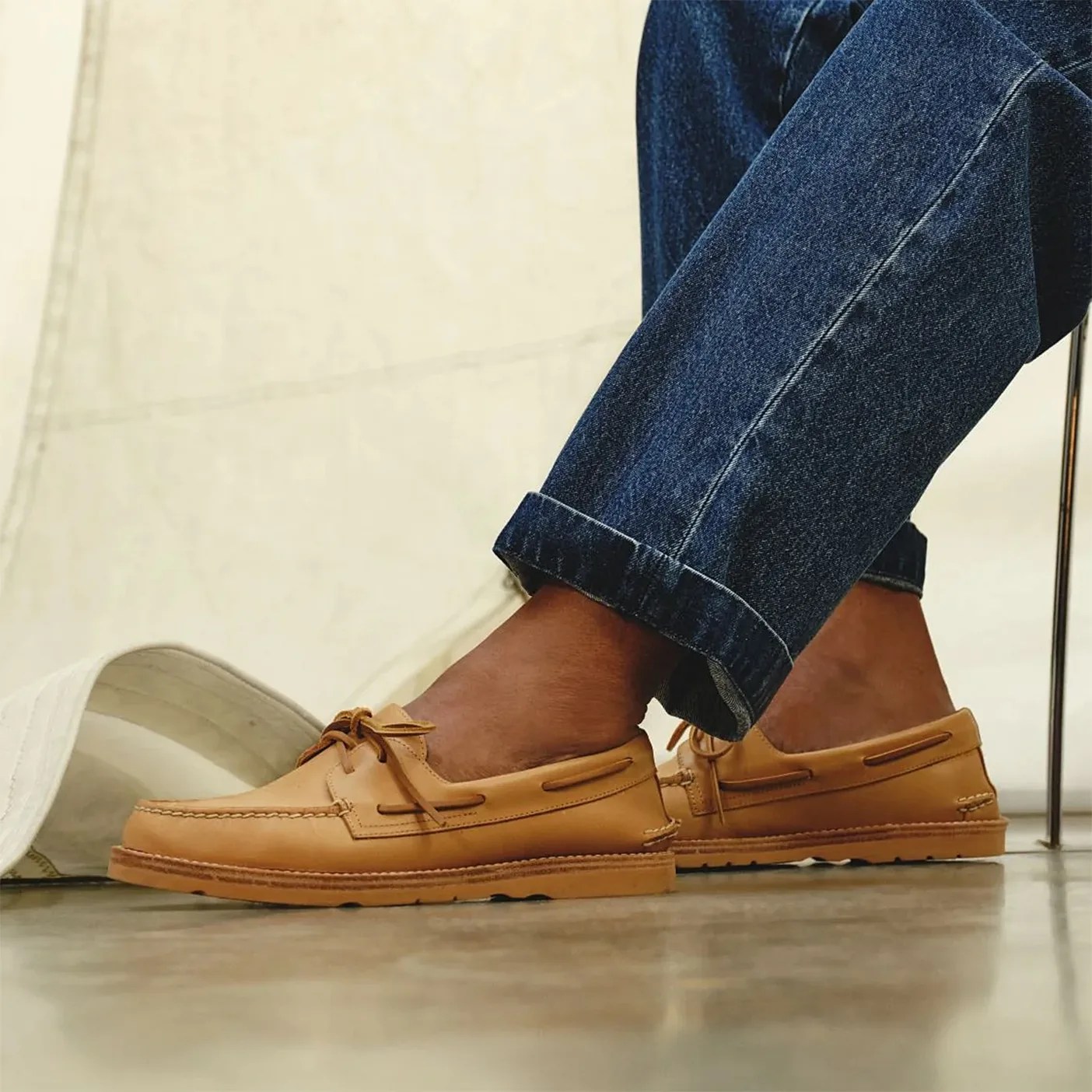 a man wearing boat shoes