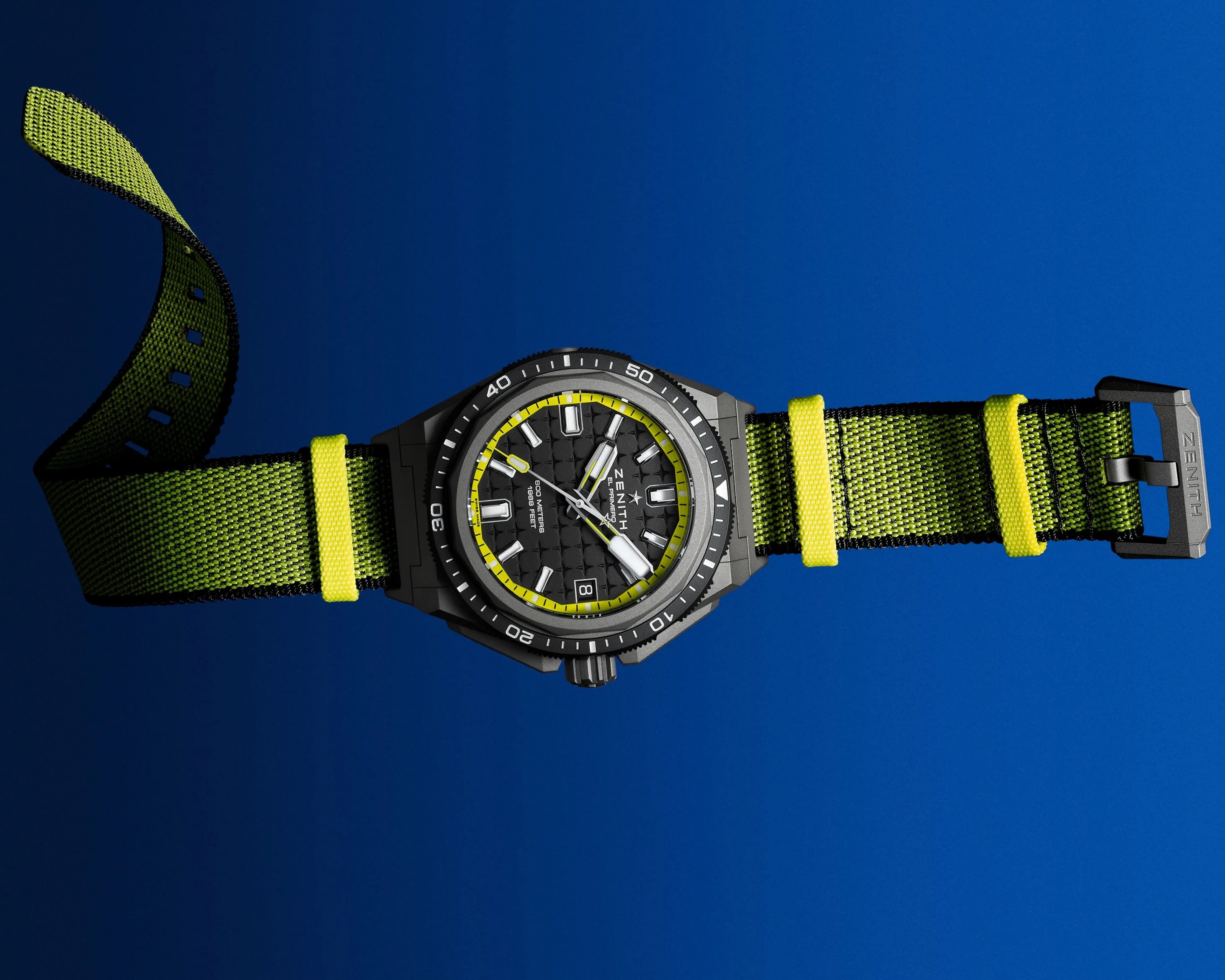 a Zenith dive watch with a yellow band