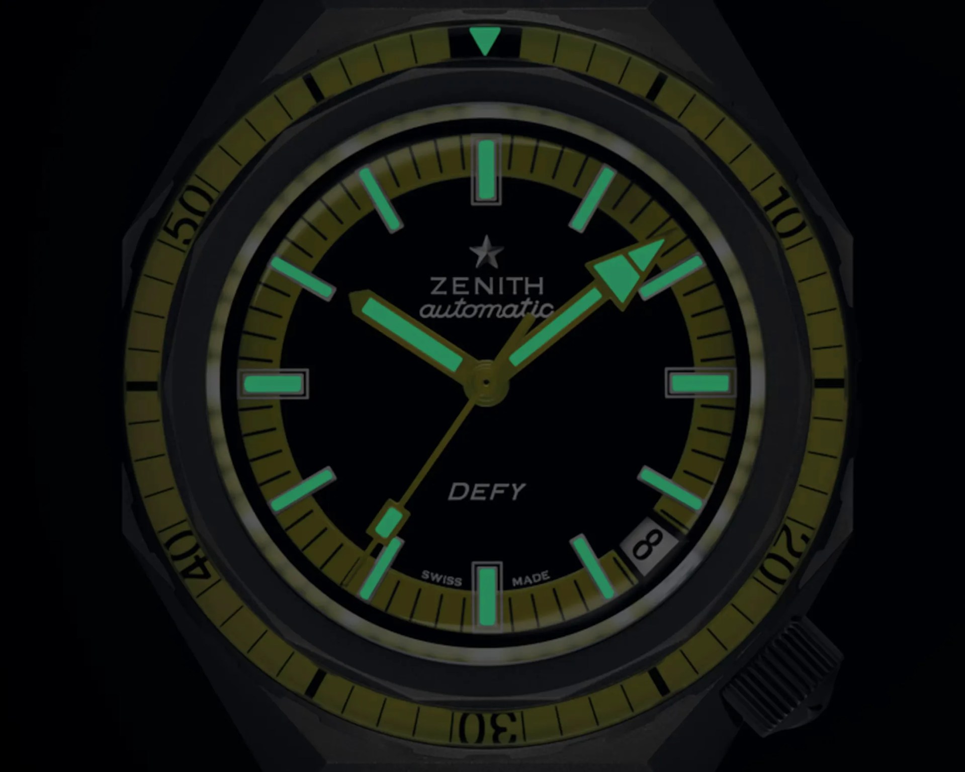 a zenith watch dial in the dark