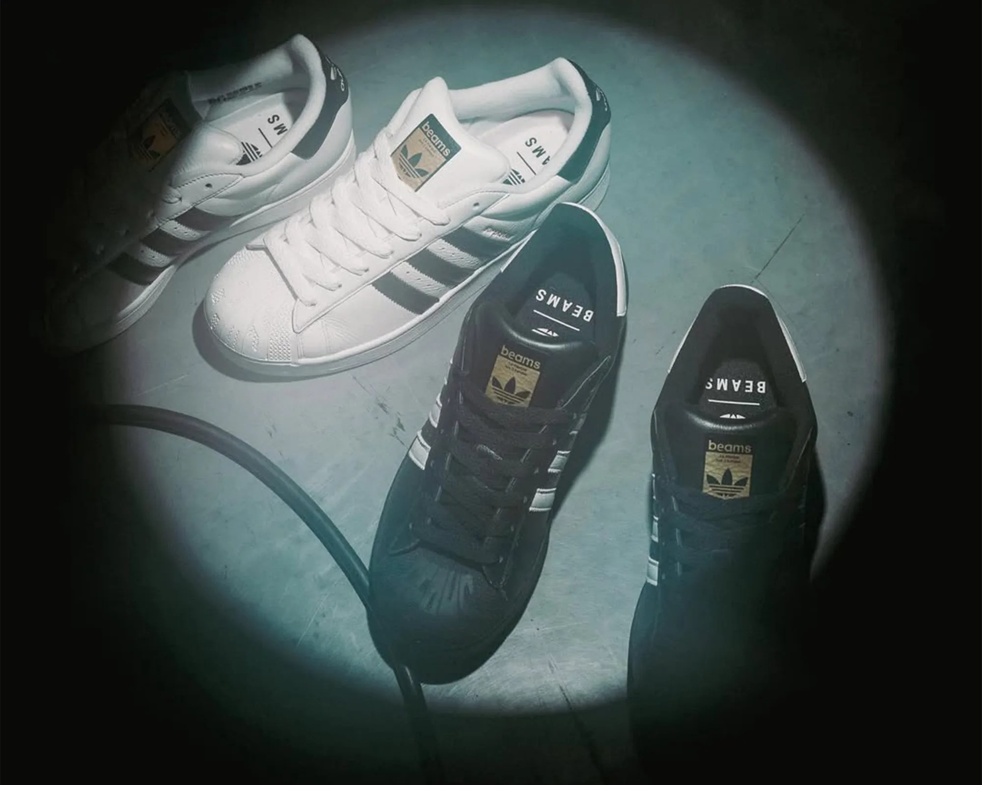 Adidas Originals × Beams Superstar II sneakers under spotlight