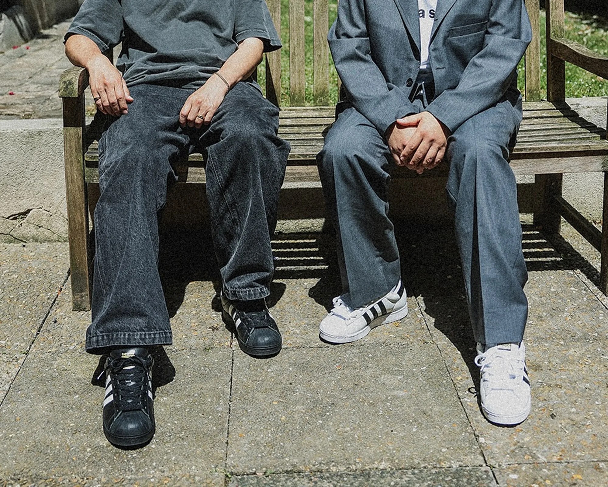 Adidas Originals × Beams Superstar II sneakers worn by people sitting on bench