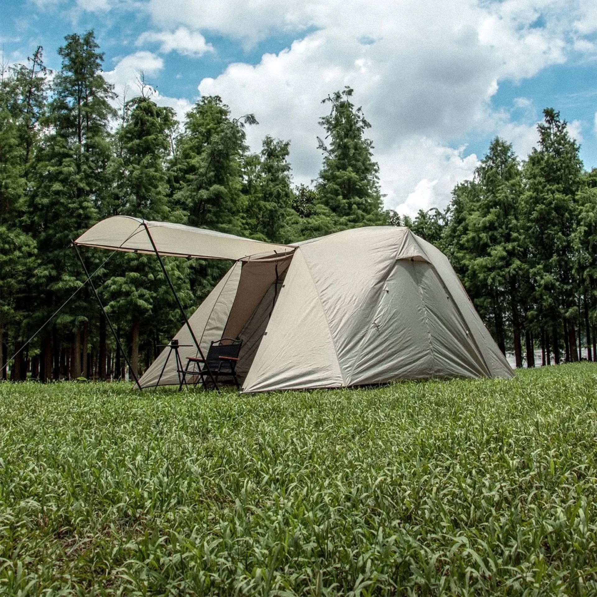 Altara Dual Awning Modular Camping Tent in tent mode with camp chair