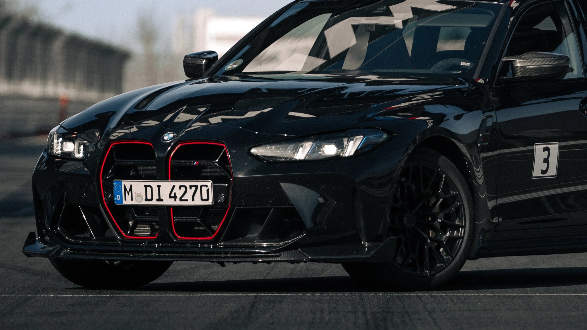 a close-up of a BMW M3 station wagon grille