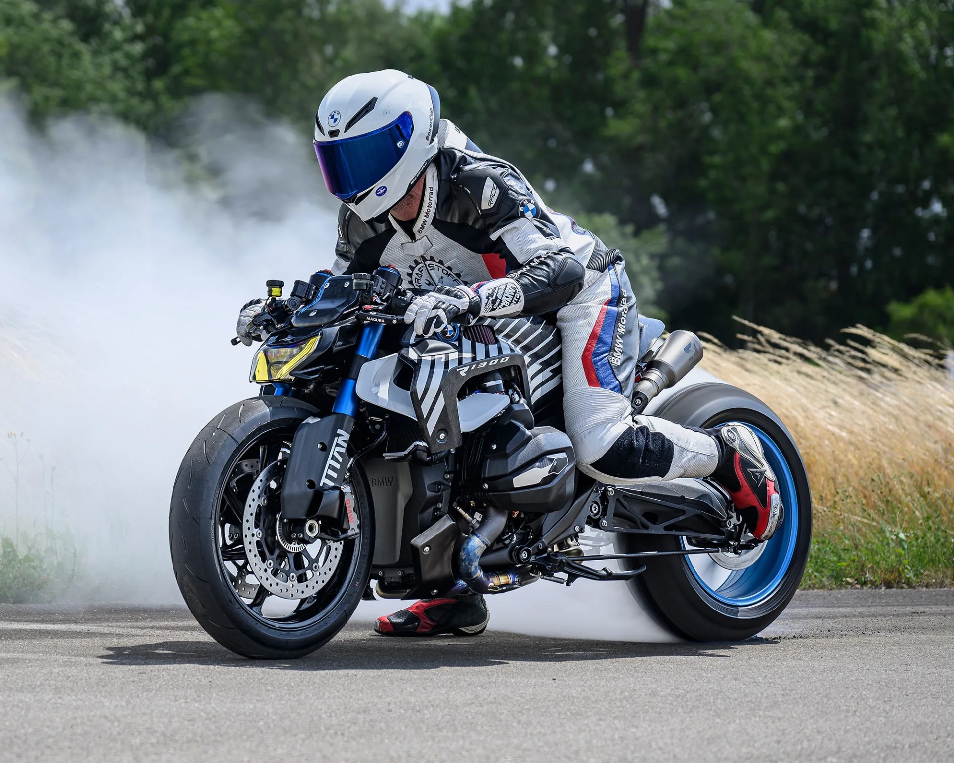 custom bmw motorcycle doing a burnout