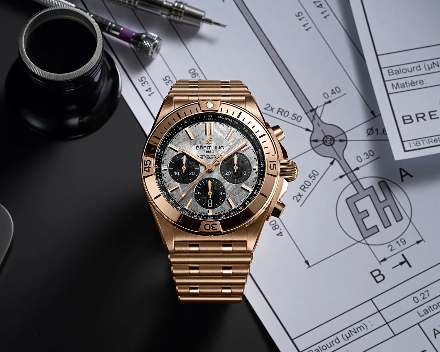 a gold breitling watch