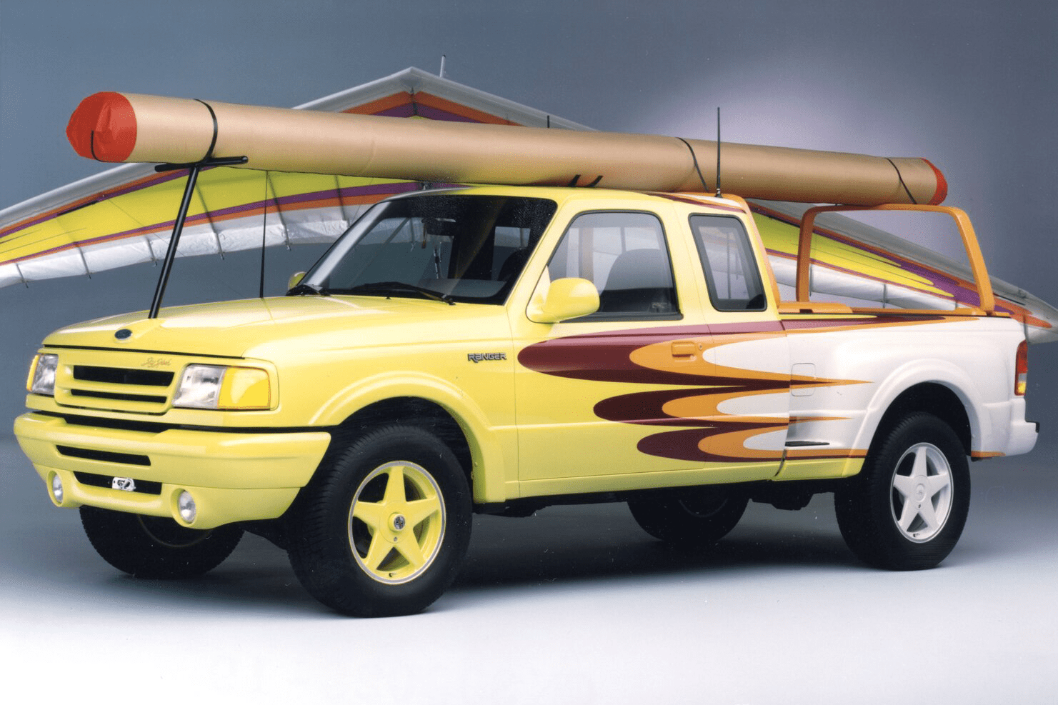 a front shot of a Ford ranger with a hang glider