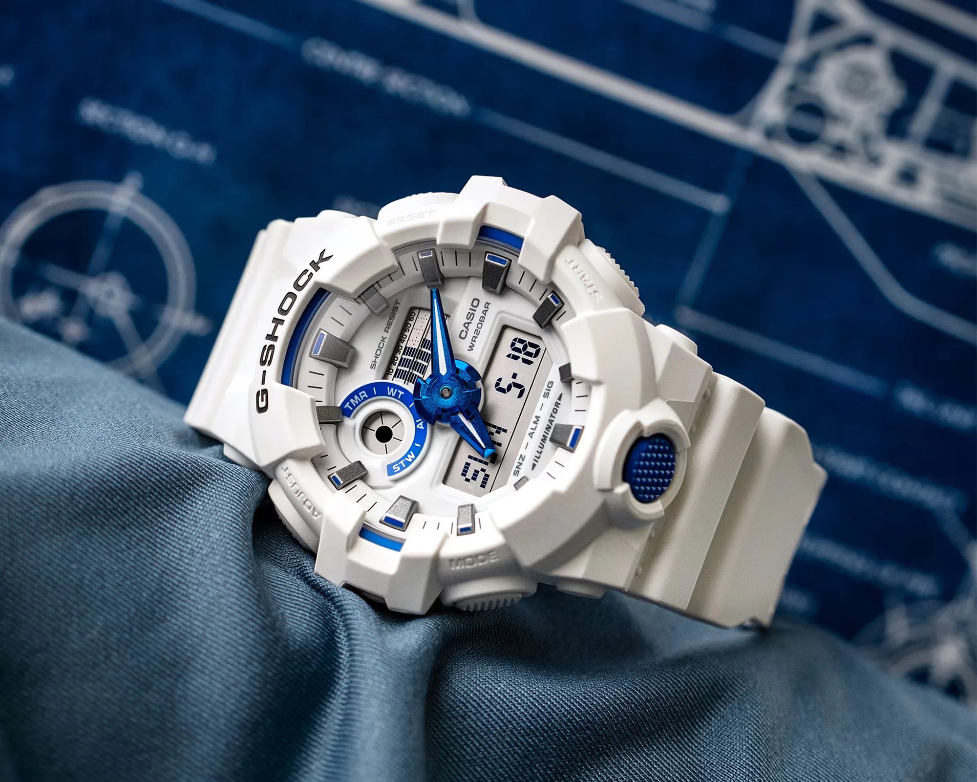 G-Shock x Marvel Fantastic Four Watch on fabric in front of blueprints