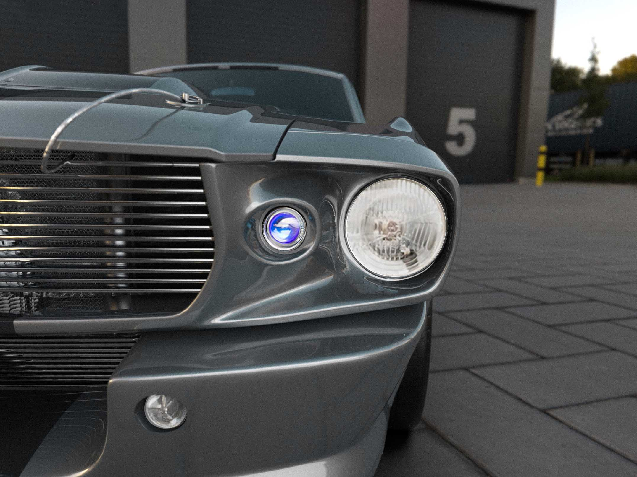 classic ford mustang headlight close-up