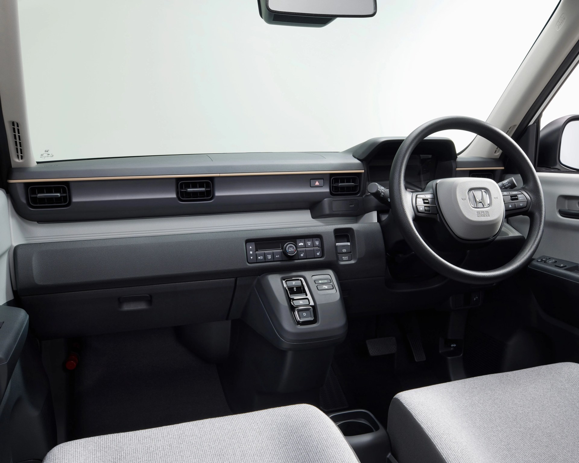 a photo showing the interior of an electric honda compact