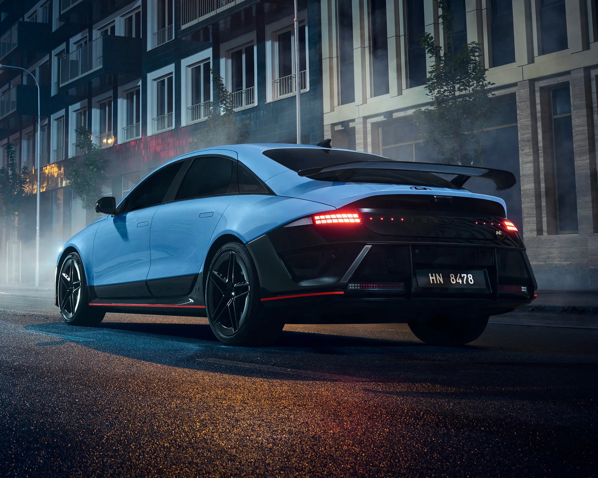 Hyundai Ioniq 6 N Sport Sedan 3/4 rear end shot in city