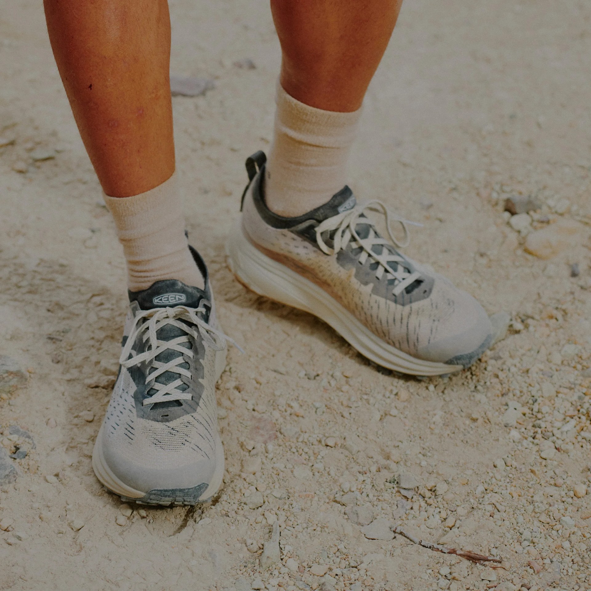 Keen Seek Trail Running Sneakers on feet on dirt trail