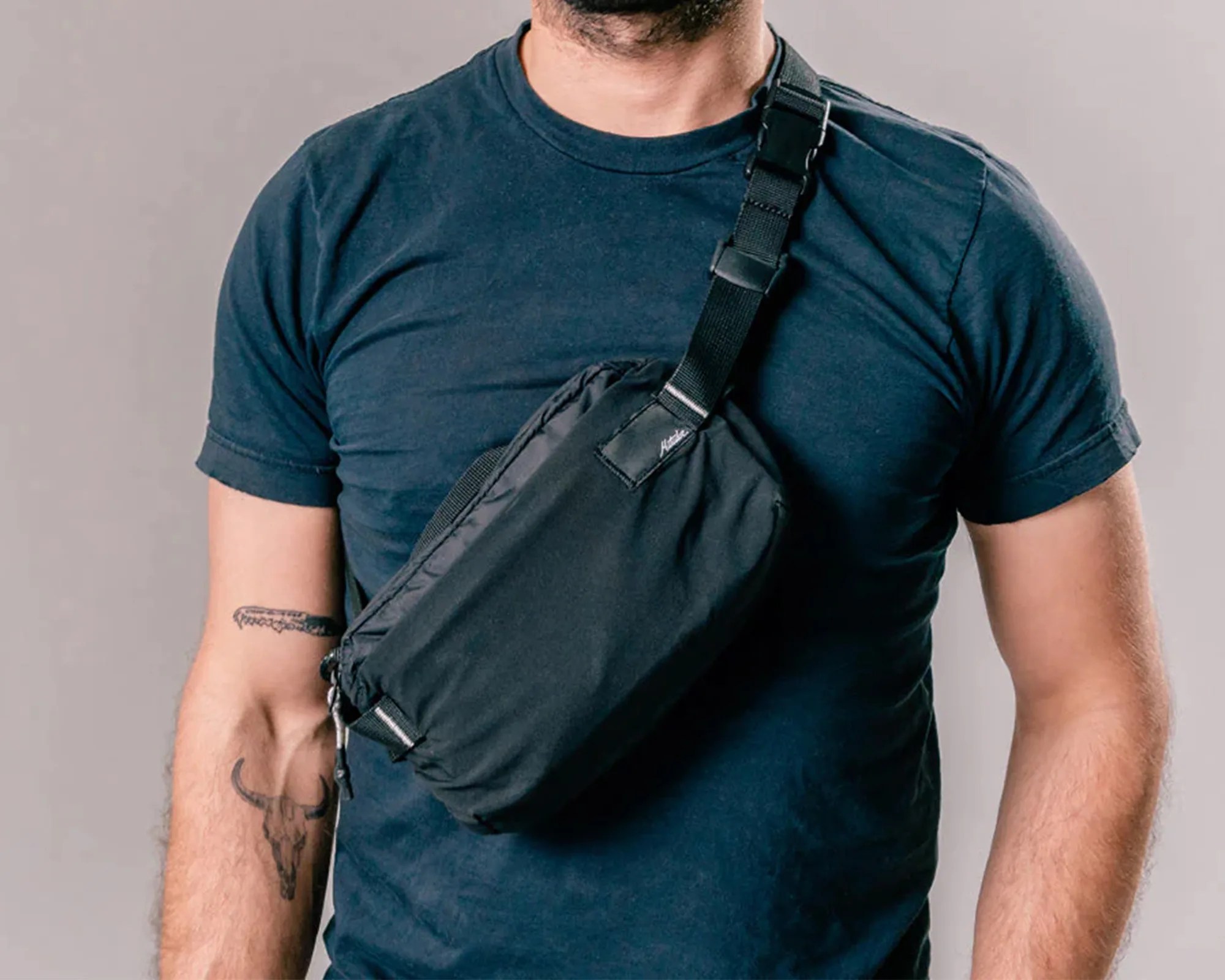 Matador ReFraction Packable Sling worn over shoulder